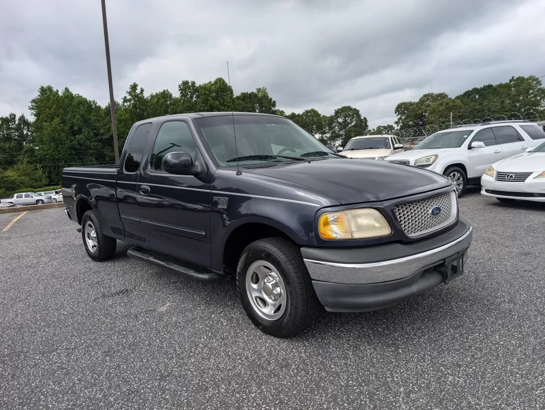 1999 Ford F-150 Work Series (1FTRX17WXXN) with an Other engine, located at 3959 U.S. 80 W, Phenix City, AL, 36870, (334) 297-4885, 32.469296, -85.135185 - **Discover the Perfect Workhorse: 1999 Ford F-150 Work Series at Gils Auto in Phenix City, AL!**<br /> <br /> Are you in need of a reliable pickup truck that can handle your daily tasks while keeping you comfortable on the road? Look no further than this rugged 1999 Ford F-150 Work Series, available - Photo#2