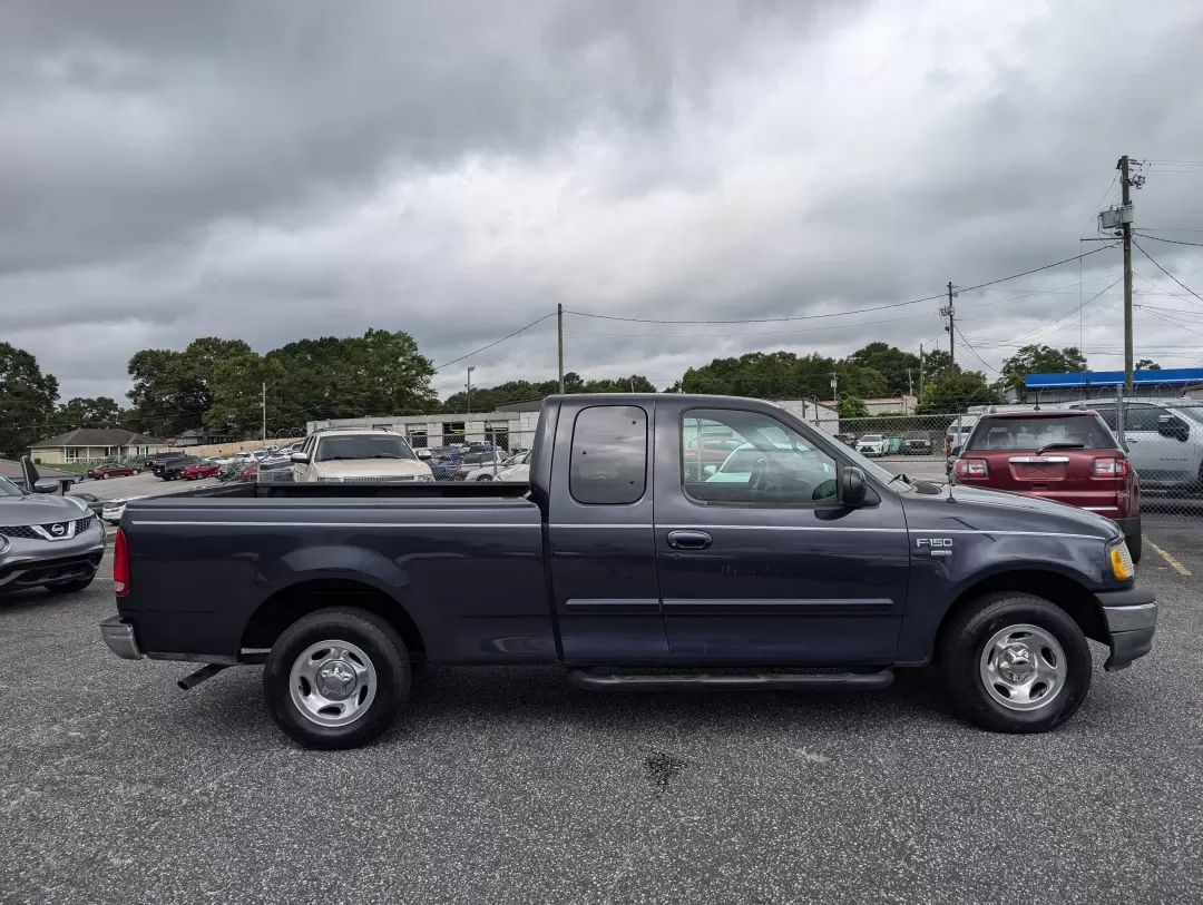 1999 Ford F-150 Work Series (1FTRX17WXXN) with an Other engine, located at 3959 U.S. 80 W, Phenix City, AL, 36870, (334) 297-4885, 32.469296, -85.135185 - **Discover the Perfect Workhorse: 1999 Ford F-150 Work Series at Gils Auto in Phenix City, AL!**<br /> <br /> Are you in need of a reliable pickup truck that can handle your daily tasks while keeping you comfortable on the road? Look no further than this rugged 1999 Ford F-150 Work Series, available - Photo#3