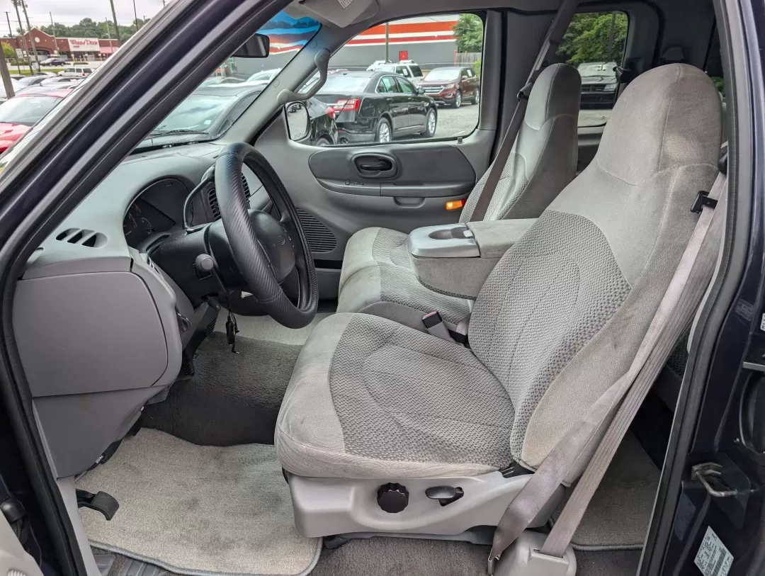 1999 Ford F-150 Work Series (1FTRX17WXXN) with an Other engine, located at 3959 U.S. 80 W, Phenix City, AL, 36870, (334) 297-4885, 32.469296, -85.135185 - **Discover the Perfect Workhorse: 1999 Ford F-150 Work Series at Gils Auto in Phenix City, AL!**<br /> <br /> Are you in need of a reliable pickup truck that can handle your daily tasks while keeping you comfortable on the road? Look no further than this rugged 1999 Ford F-150 Work Series, available - Photo#9