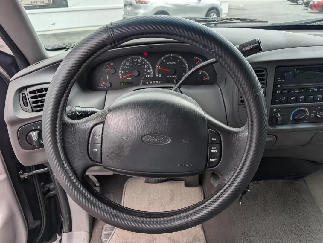 1999 Ford F-150 Work Series (1FTRX17WXXN) with an Other engine, located at 3959 U.S. 80 W, Phenix City, AL, 36870, (334) 297-4885, 32.469296, -85.135185 - **Discover the Perfect Workhorse: 1999 Ford F-150 Work Series at Gils Auto in Phenix City, AL!**<br /> <br /> Are you in need of a reliable pickup truck that can handle your daily tasks while keeping you comfortable on the road? Look no further than this rugged 1999 Ford F-150 Work Series, available - Photo#16