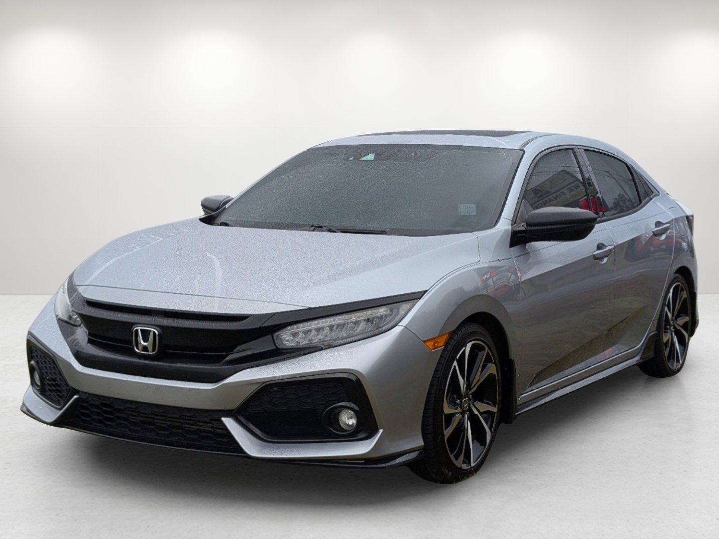 2019 Honda Civic Hatchback Sport Touring (SHHFK7H94KU) with an Intercooled Turbo Premium Unleaded I-4 1.5 L/91 engine, 1-Speed CVT w/OD transmission, located at 7000 Northlake Connector, Columbus, GA, 31904, (706) 987-8085, 32.524975, -84.978134 - 2019 Honda Civic Hatchback Sport Touring - Photo#0