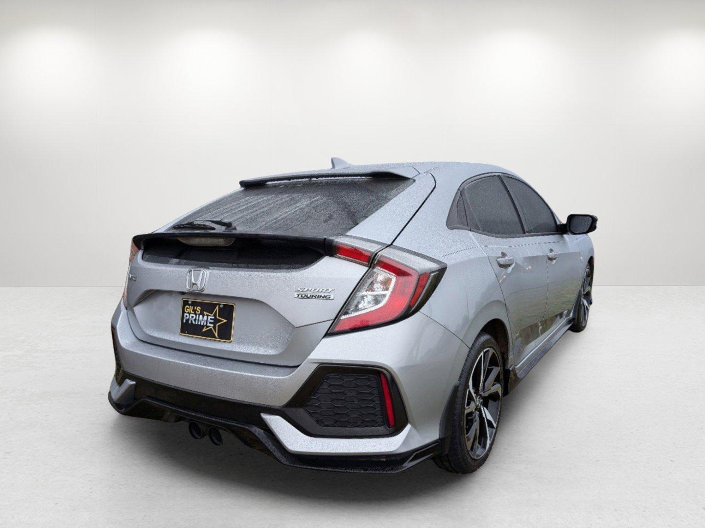 2019 Honda Civic Hatchback Sport Touring (SHHFK7H94KU) with an Intercooled Turbo Premium Unleaded I-4 1.5 L/91 engine, 1-Speed CVT w/OD transmission, located at 7000 Northlake Connector, Columbus, GA, 31904, (706) 987-8085, 32.524975, -84.978134 - 2019 Honda Civic Hatchback Sport Touring - Photo#4