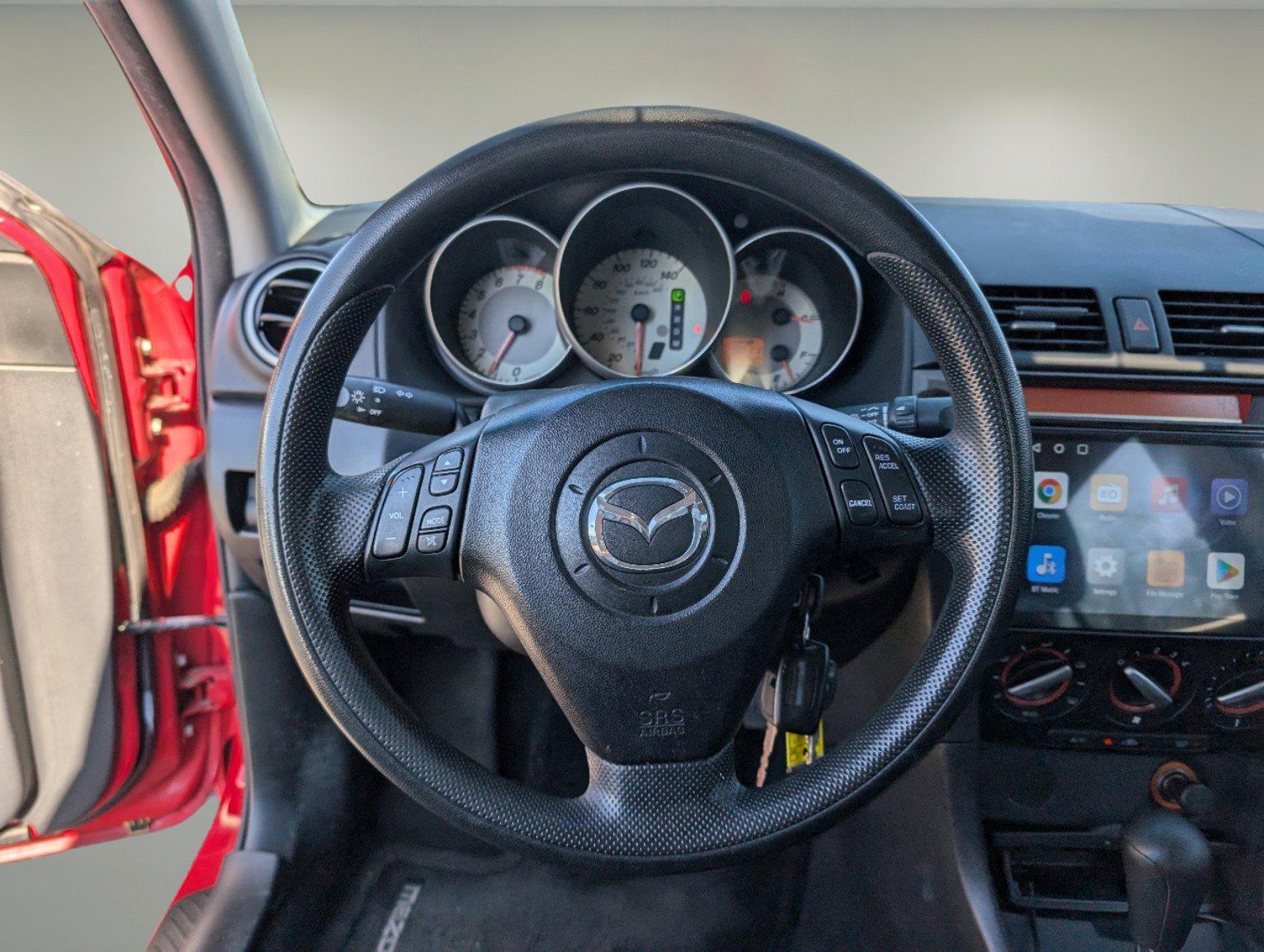 2007 /Black Mazda Mazda3 i Touring (JM1BK32G771) with an Gas I4 2.0L/122 engine, 4-Speed Automatic w/OD transmission, located at 7000 Northlake Connector, Columbus, GA, 31904, (706) 987-8085, 32.524975, -84.978134 - 2007 Mazda Mazda3 i Touring - Photo#15