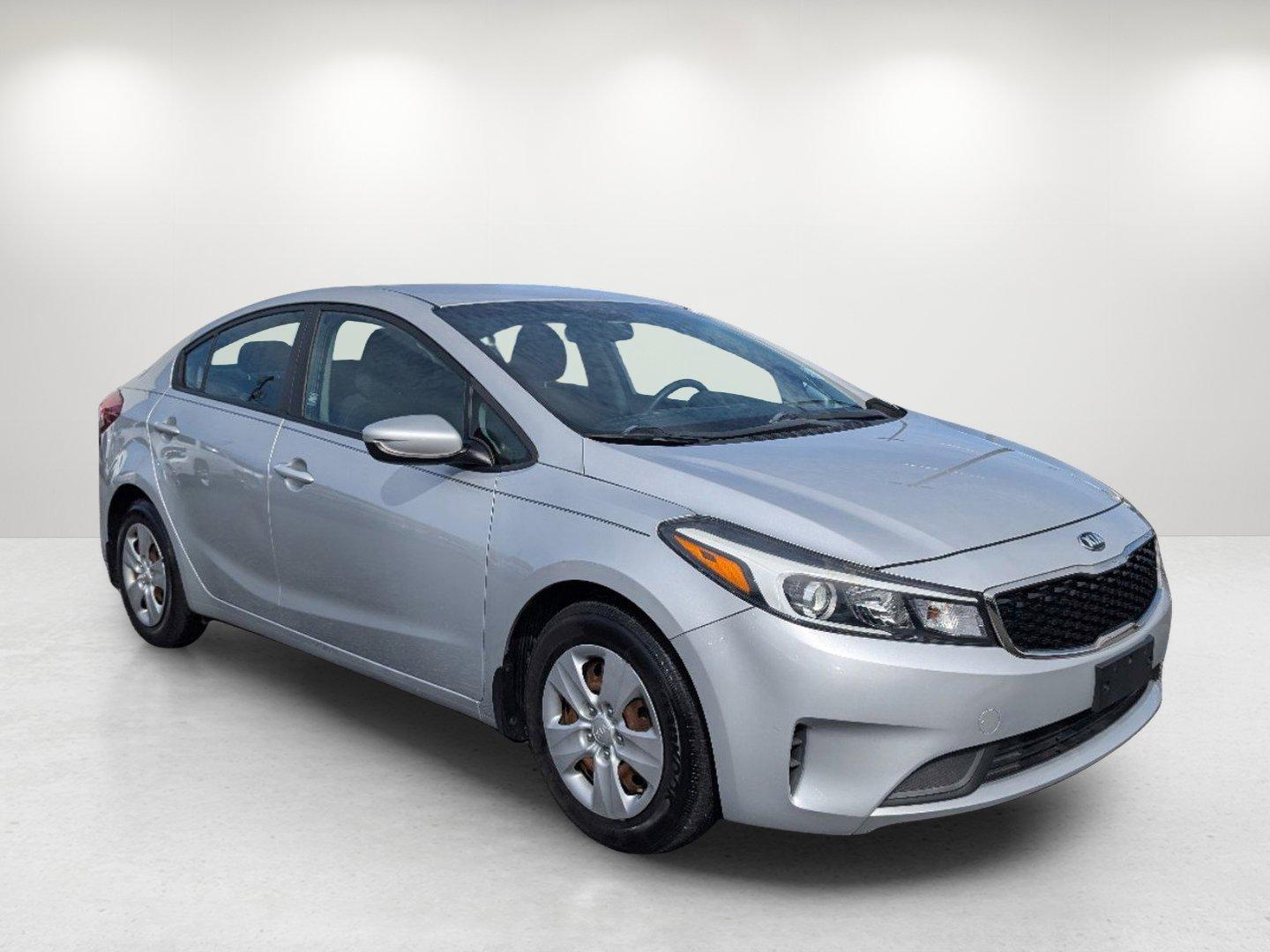 2017 /Black Kia Forte LX (3KPFL4A79HE) with an Regular Unleaded I-4 2.0 L/122 engine, 6-Speed Automatic w/OD transmission, located at 5115 14th Ave., Columbus, GA, 31904, (706) 323-0345, 32.511494, -84.971046 - 2017 Kia Forte LX - Photo#2