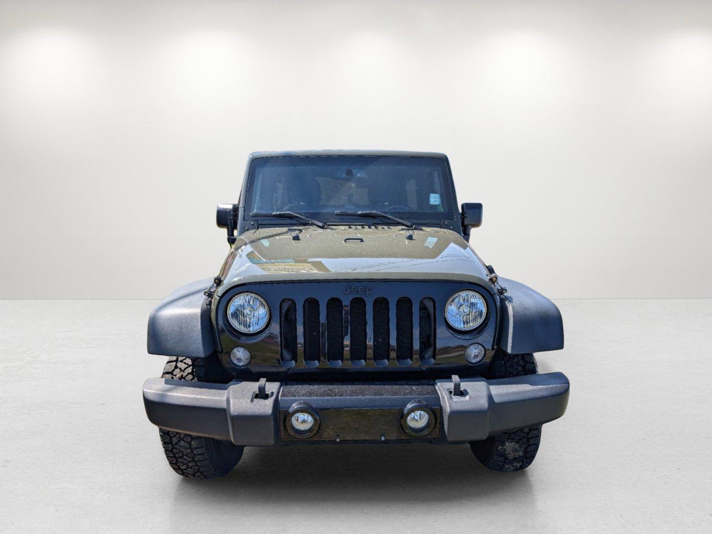 2016 /Black Jeep Wrangler Unlimited Willys Wheeler (1C4BJWDG9GL) with an Regular Unleaded V-6 3.6 L/220 engine, 6-Speed Manual w/OD transmission, located at 804 22nd Ave, Phenix City, AL, 36870, (334) 297-1860, 32.484749, -85.024475 - 2016 Jeep Wrangler Unlimited Willys Wheeler - Photo#1