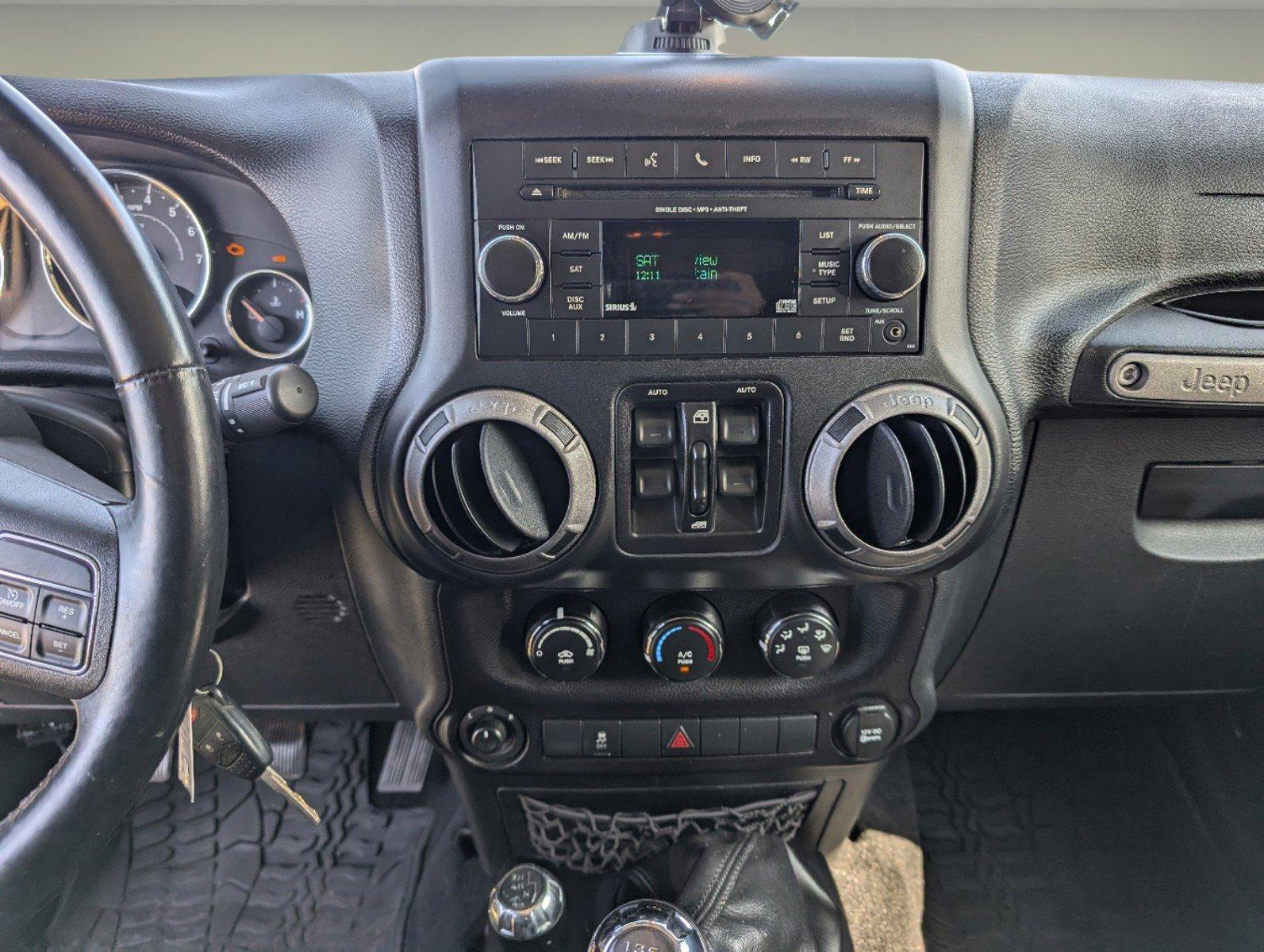 2016 /Black Jeep Wrangler Unlimited Willys Wheeler (1C4BJWDG9GL) with an Regular Unleaded V-6 3.6 L/220 engine, 6-Speed Manual w/OD transmission, located at 804 22nd Ave, Phenix City, AL, 36870, (334) 297-1860, 32.484749, -85.024475 - 2016 Jeep Wrangler Unlimited Willys Wheeler - Photo#13