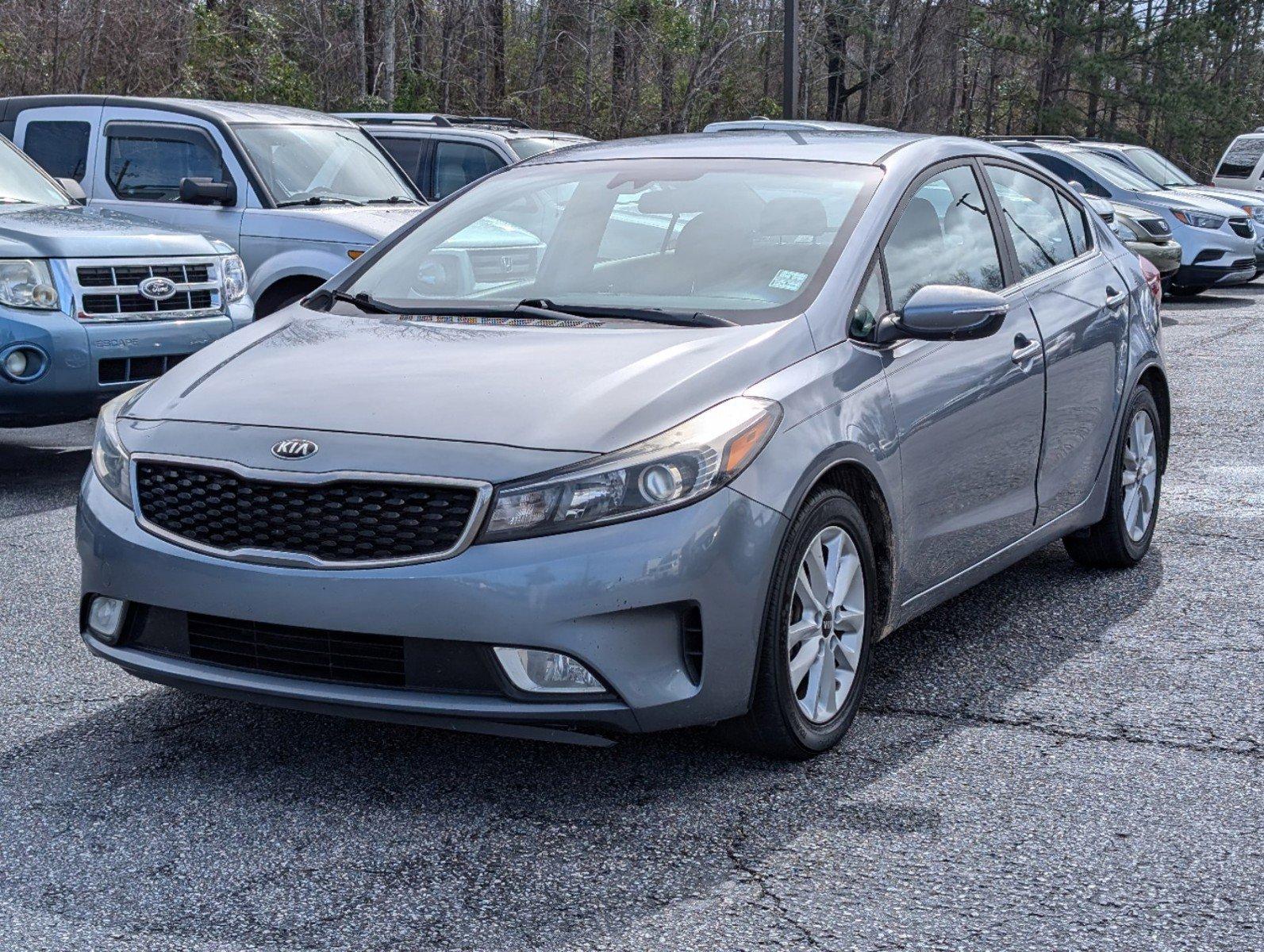 2017 /Black Kia Forte S (3KPFL4A78HE) with an Regular Unleaded I-4 2.0 L/122 engine, 6-Speed Automatic w/OD transmission, located at 521 Old Farm Lane Rd, Prattville, AL, 36066, (334) 325-1505, 32.482460, -86.416367 - 2017 Kia Forte S - Photo#0