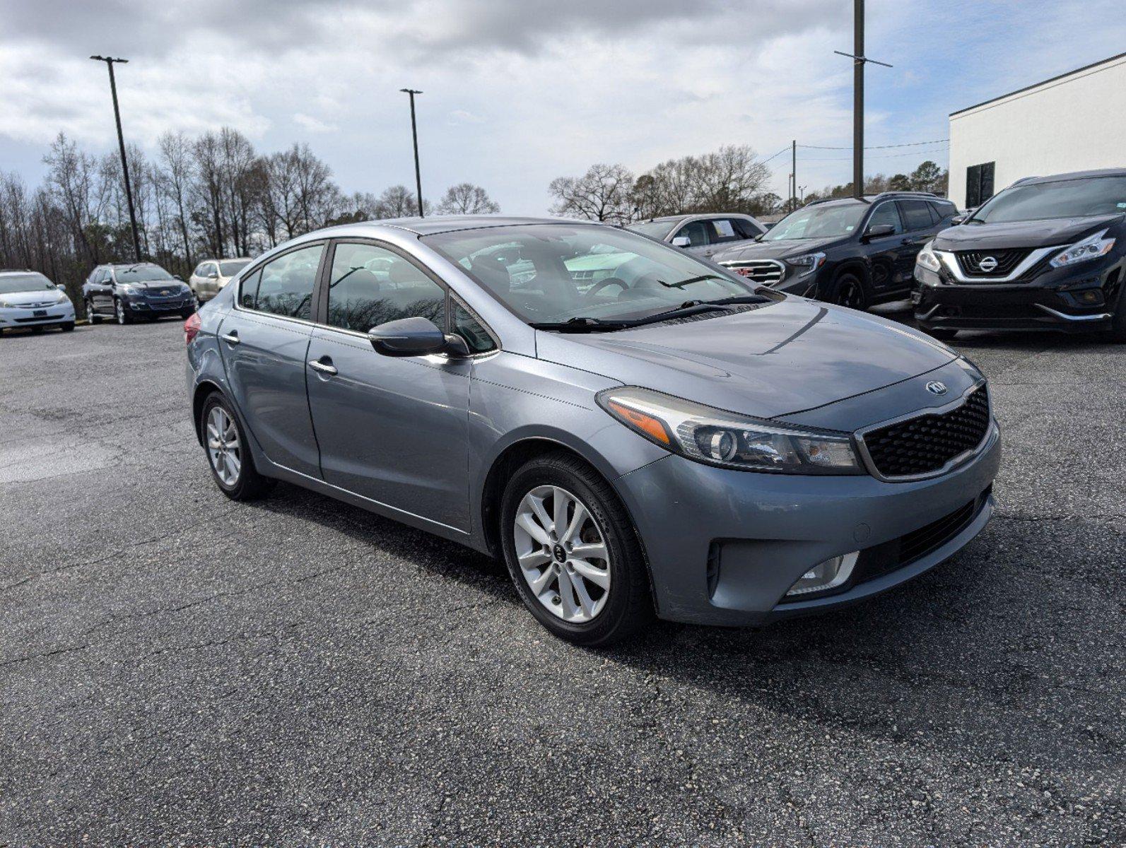 2017 /Black Kia Forte S (3KPFL4A78HE) with an Regular Unleaded I-4 2.0 L/122 engine, 6-Speed Automatic w/OD transmission, located at 521 Old Farm Lane Rd, Prattville, AL, 36066, (334) 325-1505, 32.482460, -86.416367 - 2017 Kia Forte S - Photo#2