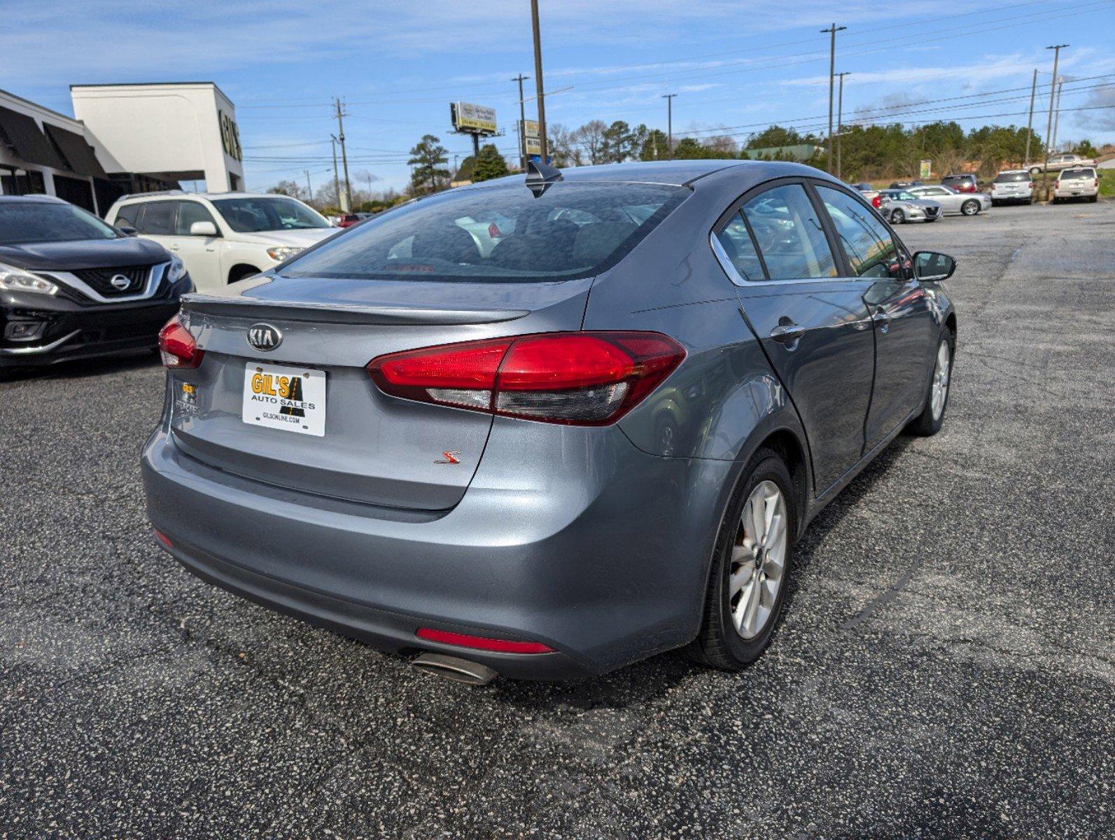 2017 /Black Kia Forte S (3KPFL4A78HE) with an Regular Unleaded I-4 2.0 L/122 engine, 6-Speed Automatic w/OD transmission, located at 521 Old Farm Lane Rd, Prattville, AL, 36066, (334) 325-1505, 32.482460, -86.416367 - 2017 Kia Forte S - Photo#4