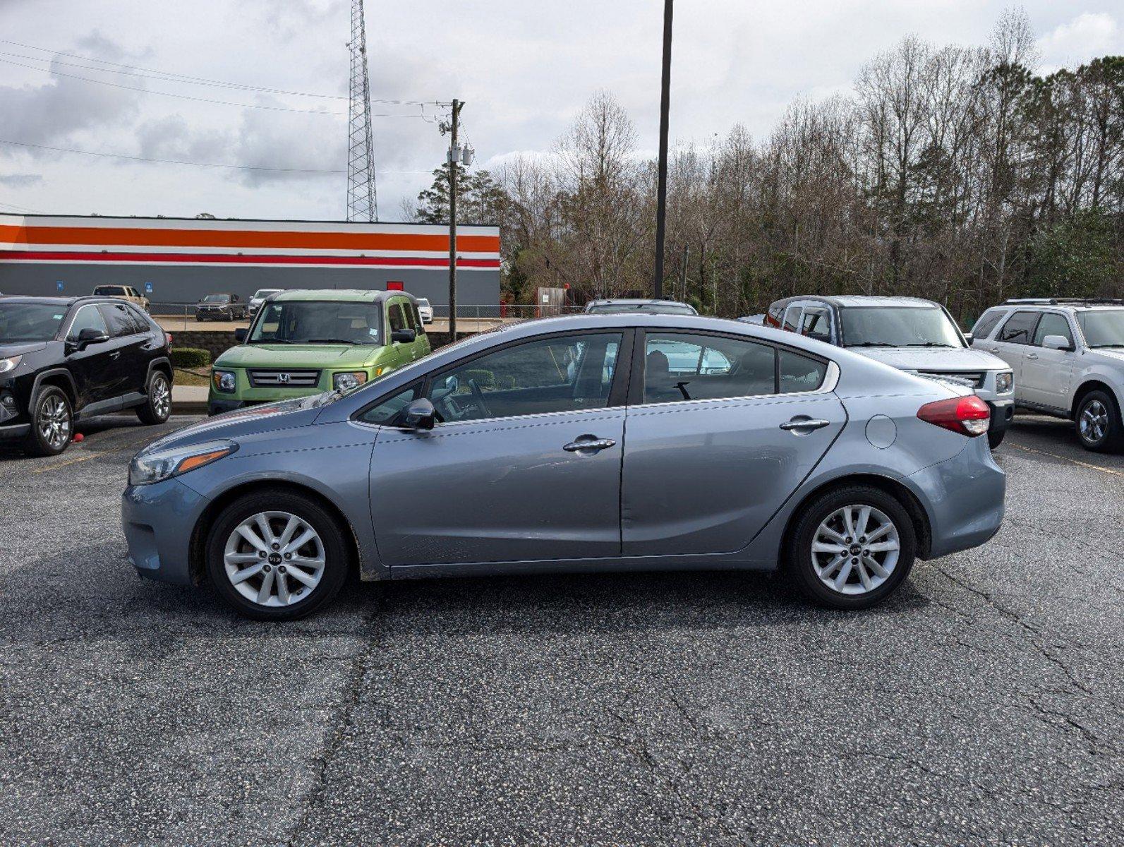 2017 /Black Kia Forte S (3KPFL4A78HE) with an Regular Unleaded I-4 2.0 L/122 engine, 6-Speed Automatic w/OD transmission, located at 521 Old Farm Lane Rd, Prattville, AL, 36066, (334) 325-1505, 32.482460, -86.416367 - 2017 Kia Forte S - Photo#7