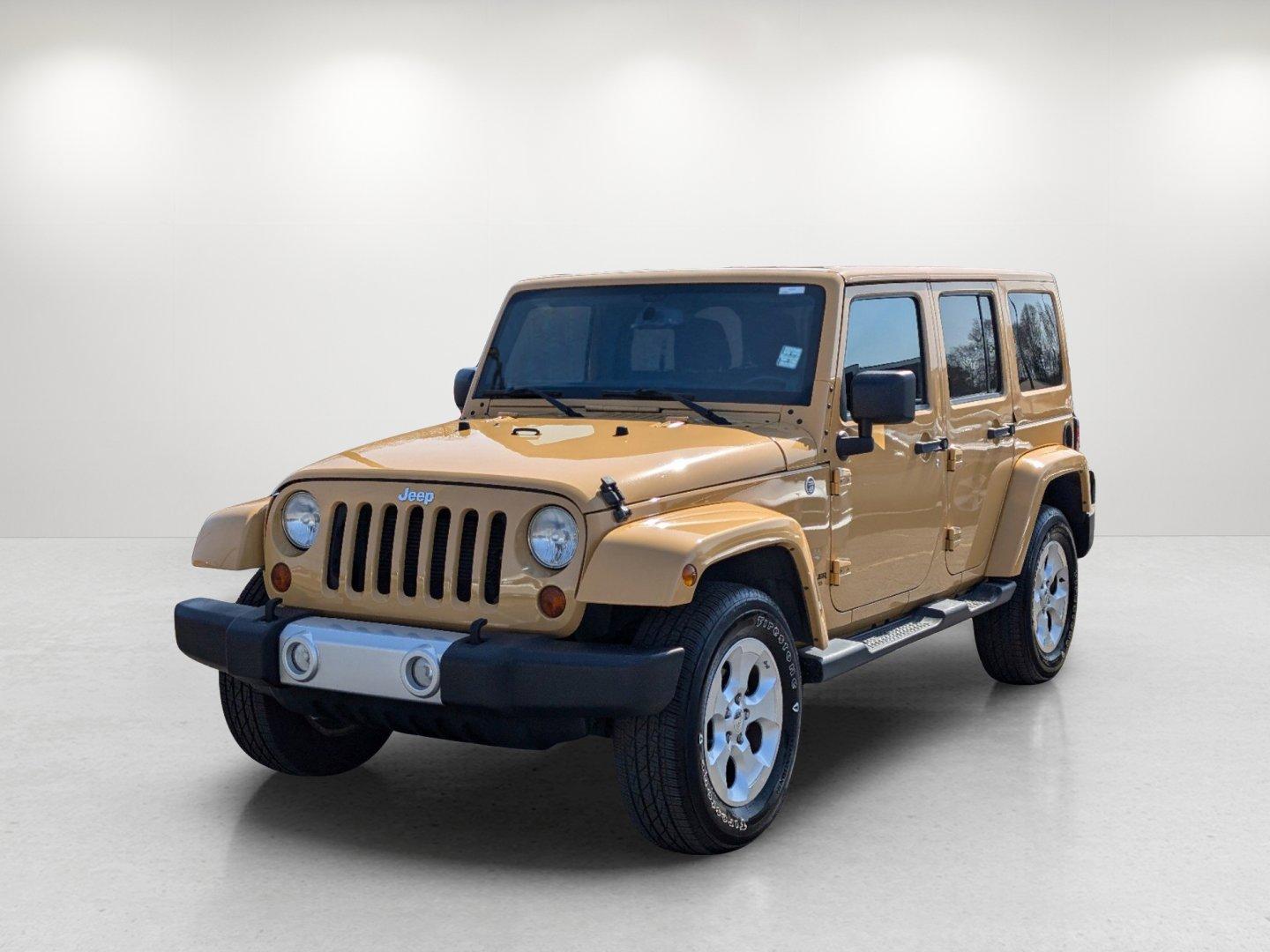 2013 /Black/Dark Saddle Interior Jeep Wrangler Unlimited Sahara (1C4BJWEG6DL) with an Gas V6 3.6L/220 engine, 5-Speed Automatic transmission, located at 804 22nd Ave, Phenix City, AL, 36870, (334) 297-1860, 32.484749, -85.024475 - 2013 Jeep Wrangler Unlimited Sahara - Photo#0