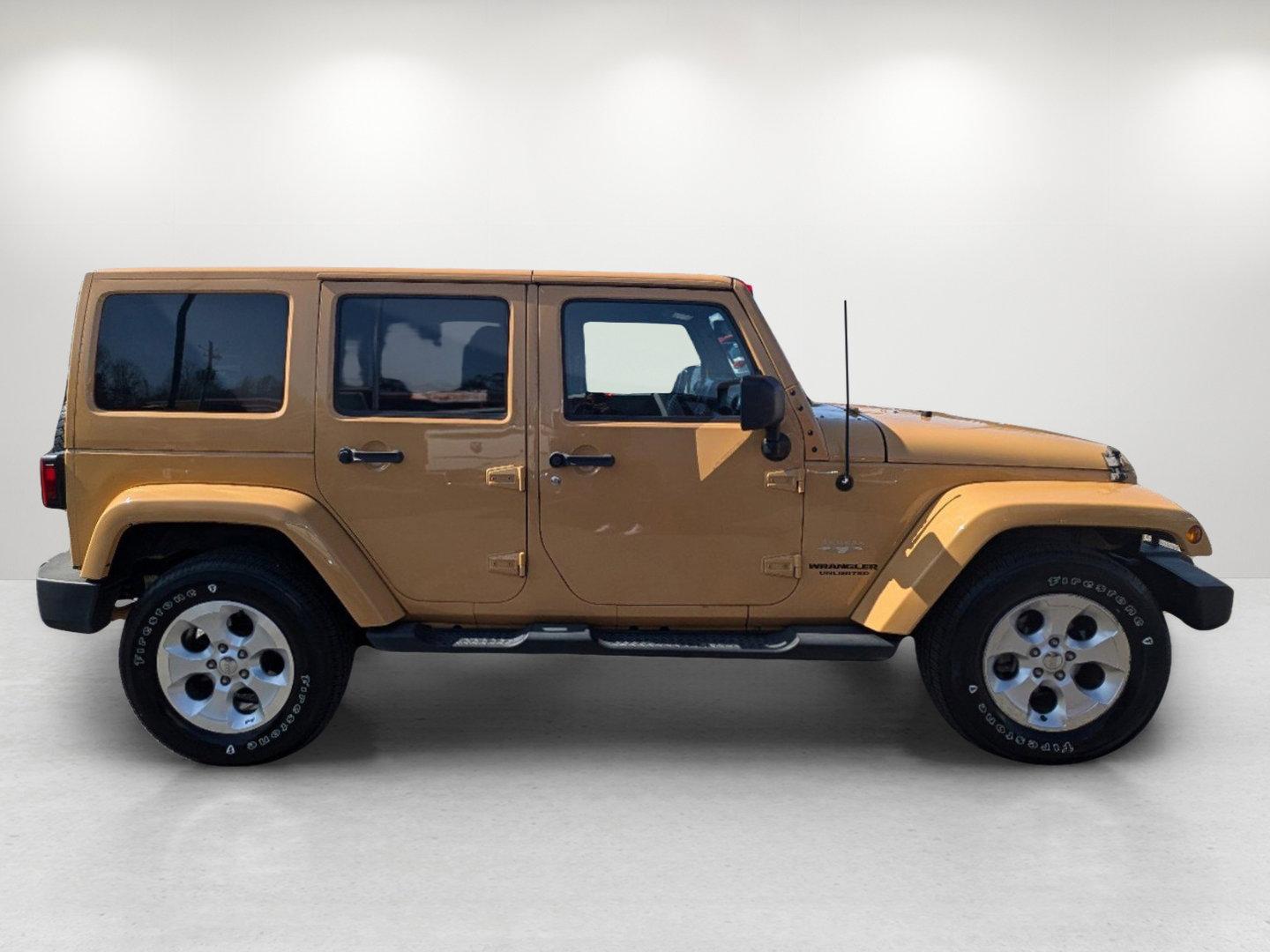 2013 /Black/Dark Saddle Interior Jeep Wrangler Unlimited Sahara (1C4BJWEG6DL) with an Gas V6 3.6L/220 engine, 5-Speed Automatic transmission, located at 804 22nd Ave, Phenix City, AL, 36870, (334) 297-1860, 32.484749, -85.024475 - 2013 Jeep Wrangler Unlimited Sahara - Photo#3