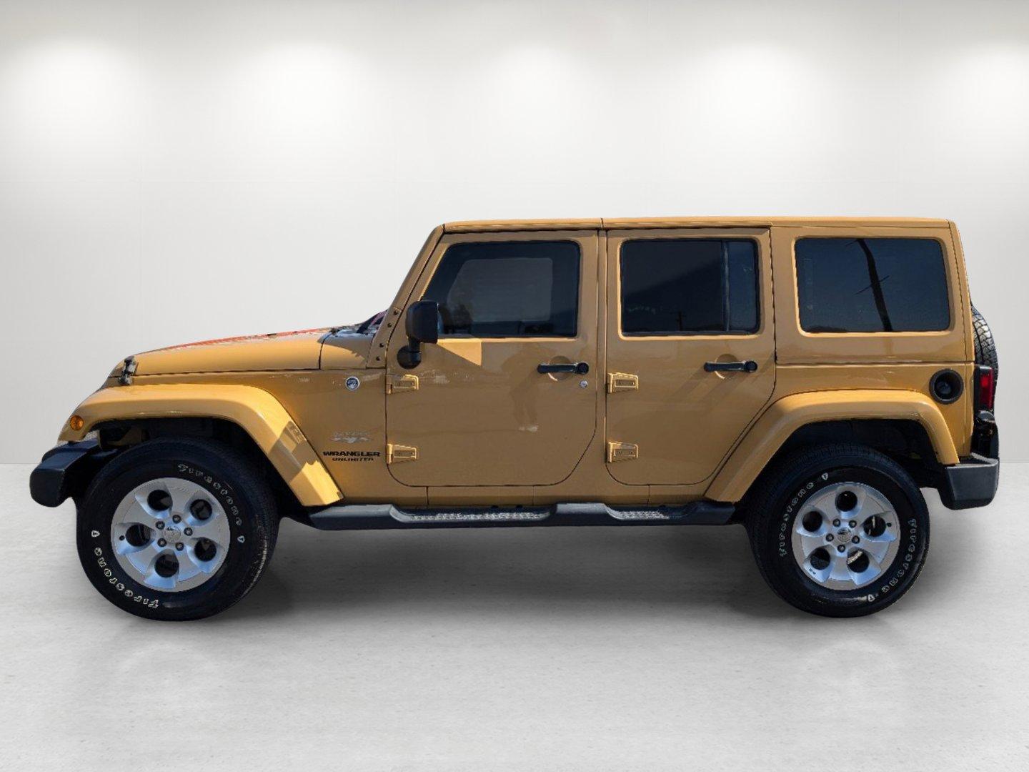 2013 /Black/Dark Saddle Interior Jeep Wrangler Unlimited Sahara (1C4BJWEG6DL) with an Gas V6 3.6L/220 engine, 5-Speed Automatic transmission, located at 804 22nd Ave, Phenix City, AL, 36870, (334) 297-1860, 32.484749, -85.024475 - 2013 Jeep Wrangler Unlimited Sahara - Photo#7