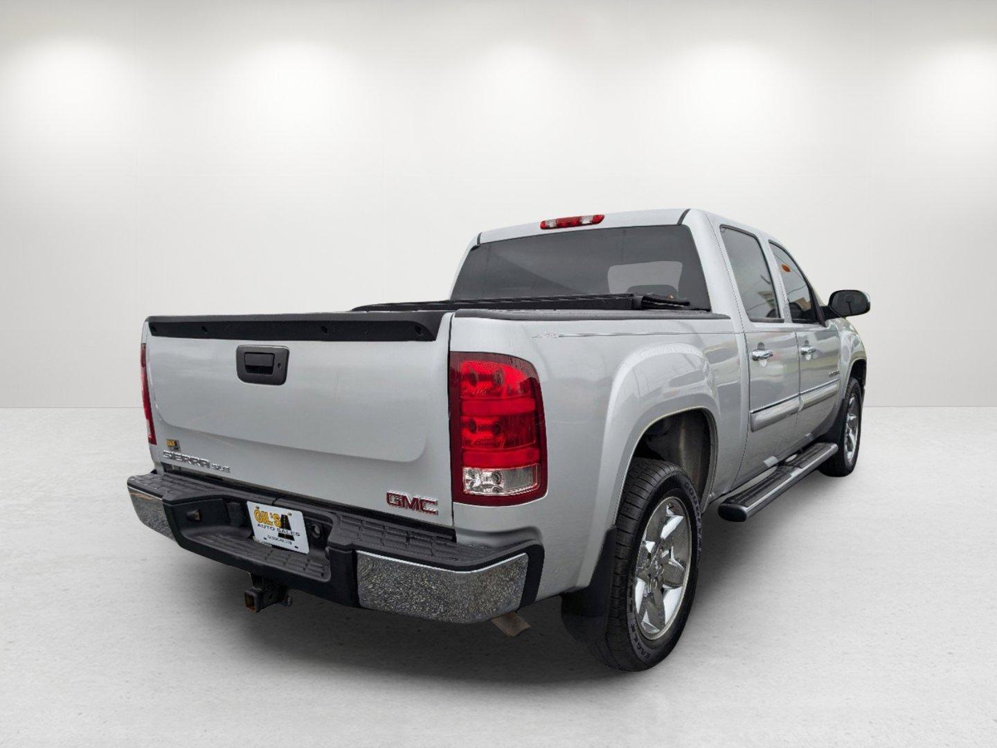 2012 /Ebony GMC Sierra 1500 SLE (3GTP1VE03CG) with an Gas/Ethanol V8 5.3L/323 engine, 6-Speed Automatic transmission, located at 3959 U.S. 80 W, Phenix City, AL, 36870, (334) 297-4885, 32.469296, -85.135185 - 2012 GMC Sierra 1500 SLE - Photo#4