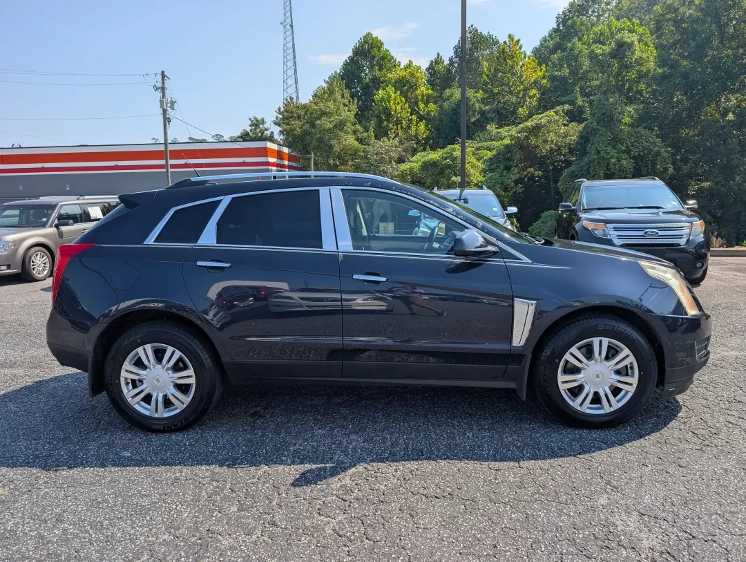 2014 /Light Titanium w/Ebony accents Cadillac SRX Luxury Collection (3GYFNBE30ES) with an Other engine, located at 3959 U.S. 80 W, Phenix City, AL, 36870, (334) 297-4885, 32.469296, -85.135185 - **Elevate Your Lifestyle with the 2014 Cadillac SRX Luxury Collection at Gils Auto** <br /> <br /> Are you ready to experience the perfect blend of luxury and functionality? Whether you're a growing family in need of a spacious SUV, a daily commuter seeking comfort, or someone who loves weekend get - Photo#3