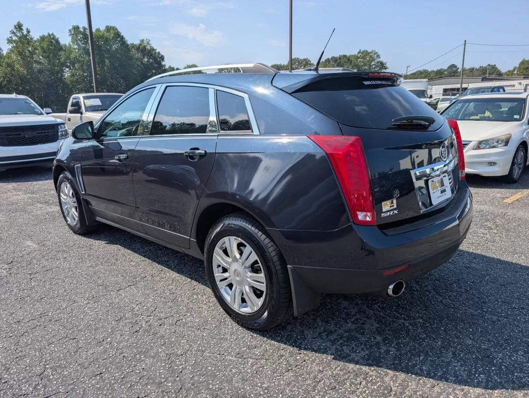 2014 /Light Titanium w/Ebony accents Cadillac SRX Luxury Collection (3GYFNBE30ES) with an Other engine, located at 3959 U.S. 80 W, Phenix City, AL, 36870, (334) 297-4885, 32.469296, -85.135185 - **Elevate Your Lifestyle with the 2014 Cadillac SRX Luxury Collection at Gils Auto** <br /> <br /> Are you ready to experience the perfect blend of luxury and functionality? Whether you're a growing family in need of a spacious SUV, a daily commuter seeking comfort, or someone who loves weekend get - Photo#6