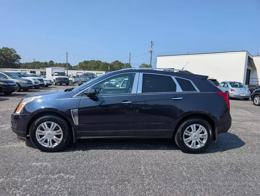 2014 /Light Titanium w/Ebony accents Cadillac SRX Luxury Collection (3GYFNBE30ES) with an Other engine, located at 3959 U.S. 80 W, Phenix City, AL, 36870, (334) 297-4885, 32.469296, -85.135185 - **Elevate Your Lifestyle with the 2014 Cadillac SRX Luxury Collection at Gils Auto** <br /> <br /> Are you ready to experience the perfect blend of luxury and functionality? Whether you're a growing family in need of a spacious SUV, a daily commuter seeking comfort, or someone who loves weekend get - Photo#7