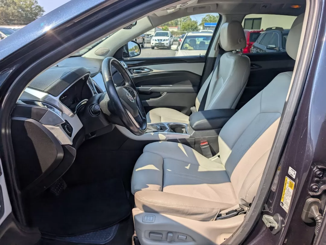 2014 /Light Titanium w/Ebony accents Cadillac SRX Luxury Collection (3GYFNBE30ES) with an Other engine, located at 3959 U.S. 80 W, Phenix City, AL, 36870, (334) 297-4885, 32.469296, -85.135185 - **Elevate Your Lifestyle with the 2014 Cadillac SRX Luxury Collection at Gils Auto** <br /> <br /> Are you ready to experience the perfect blend of luxury and functionality? Whether you're a growing family in need of a spacious SUV, a daily commuter seeking comfort, or someone who loves weekend get - Photo#9