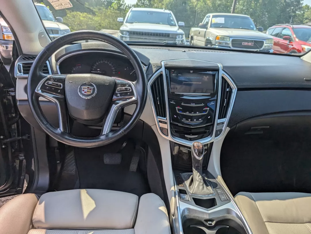2014 /Light Titanium w/Ebony accents Cadillac SRX Luxury Collection (3GYFNBE30ES) with an Other engine, located at 3959 U.S. 80 W, Phenix City, AL, 36870, (334) 297-4885, 32.469296, -85.135185 - **Elevate Your Lifestyle with the 2014 Cadillac SRX Luxury Collection at Gils Auto** <br /> <br /> Are you ready to experience the perfect blend of luxury and functionality? Whether you're a growing family in need of a spacious SUV, a daily commuter seeking comfort, or someone who loves weekend get - Photo#11