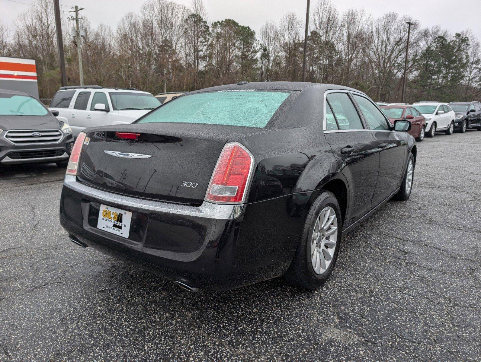 2011 /Black Interior Chrysler 300 (2C3CA4CGXBH) with an Gas/Ethanol V6 3.6L/220 engine, 5-Speed Automatic w/Manual Shift transmission, located at 804 22nd Ave, Phenix City, AL, 36870, (334) 297-1860, 32.484749, -85.024475 - 2011 Chrysler 300 - Photo#4