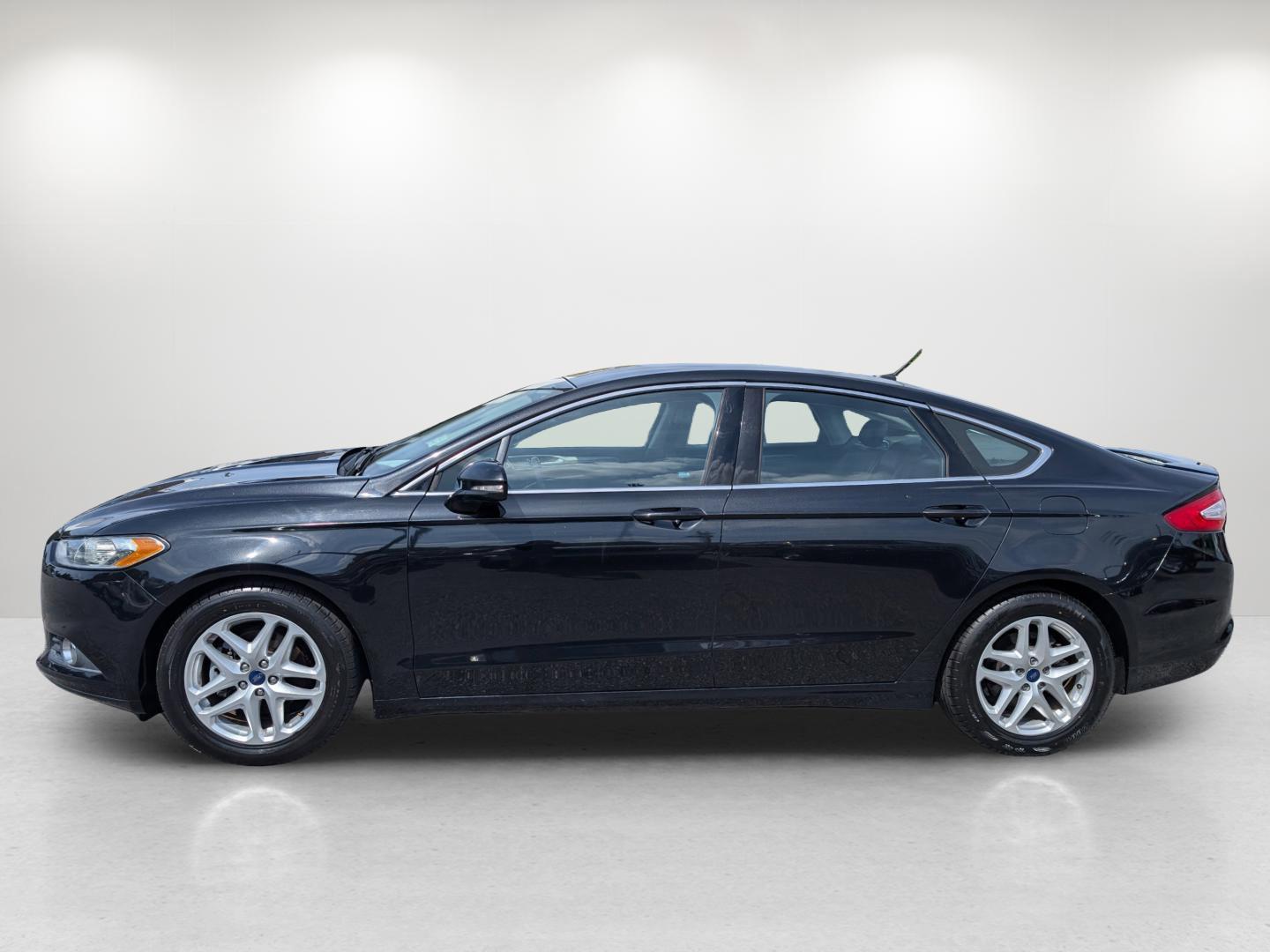 2015 Ford Fusion SE (3FA6P0HD0FR) with an Intercooled Turbo Regular Unleaded I-4 1.5 L/91 engine, located at 1430 Gateway Drive, Opelika, AL, 36801, (334) 239-0944, 32.637871, -85.409790 - 2015 Ford Fusion SE - Photo#1