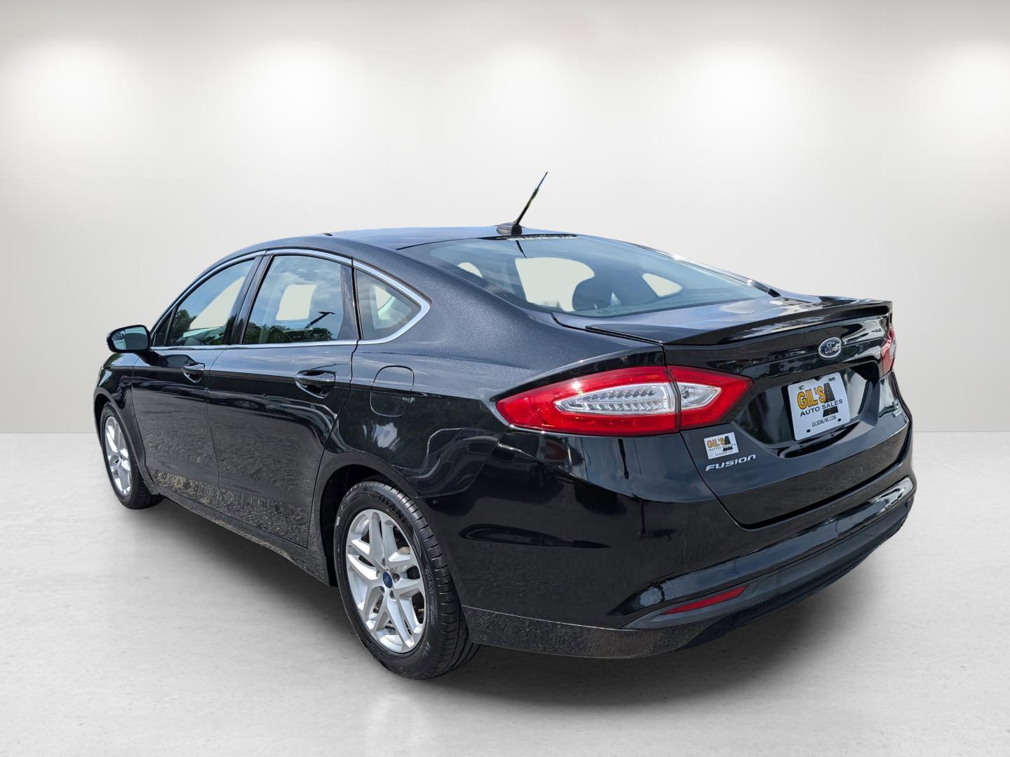 2015 Ford Fusion SE (3FA6P0HD0FR) with an Intercooled Turbo Regular Unleaded I-4 1.5 L/91 engine, located at 1430 Gateway Drive, Opelika, AL, 36801, (334) 239-0944, 32.637871, -85.409790 - 2015 Ford Fusion SE - Photo#2