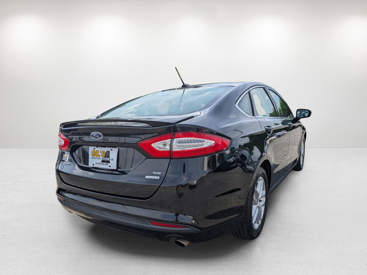 2015 Ford Fusion SE (3FA6P0HD0FR) with an Intercooled Turbo Regular Unleaded I-4 1.5 L/91 engine, located at 1430 Gateway Drive, Opelika, AL, 36801, (334) 239-0944, 32.637871, -85.409790 - 2015 Ford Fusion SE - Photo#4