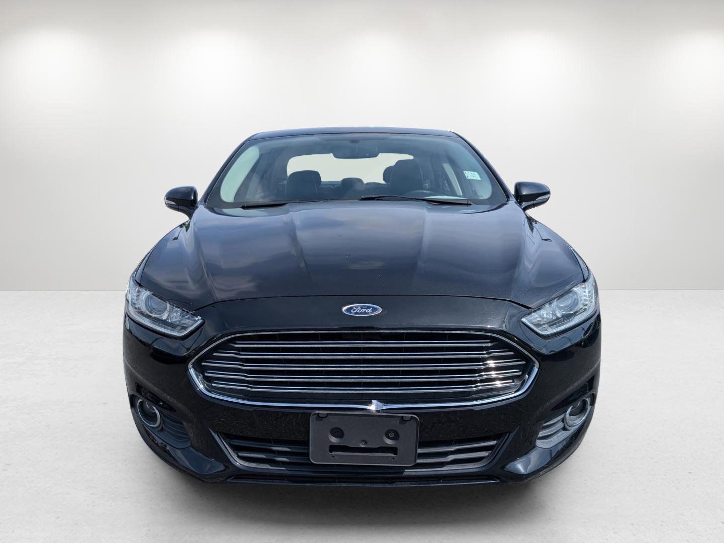 2015 Ford Fusion SE (3FA6P0HD0FR) with an Intercooled Turbo Regular Unleaded I-4 1.5 L/91 engine, located at 1430 Gateway Drive, Opelika, AL, 36801, (334) 239-0944, 32.637871, -85.409790 - 2015 Ford Fusion SE - Photo#7