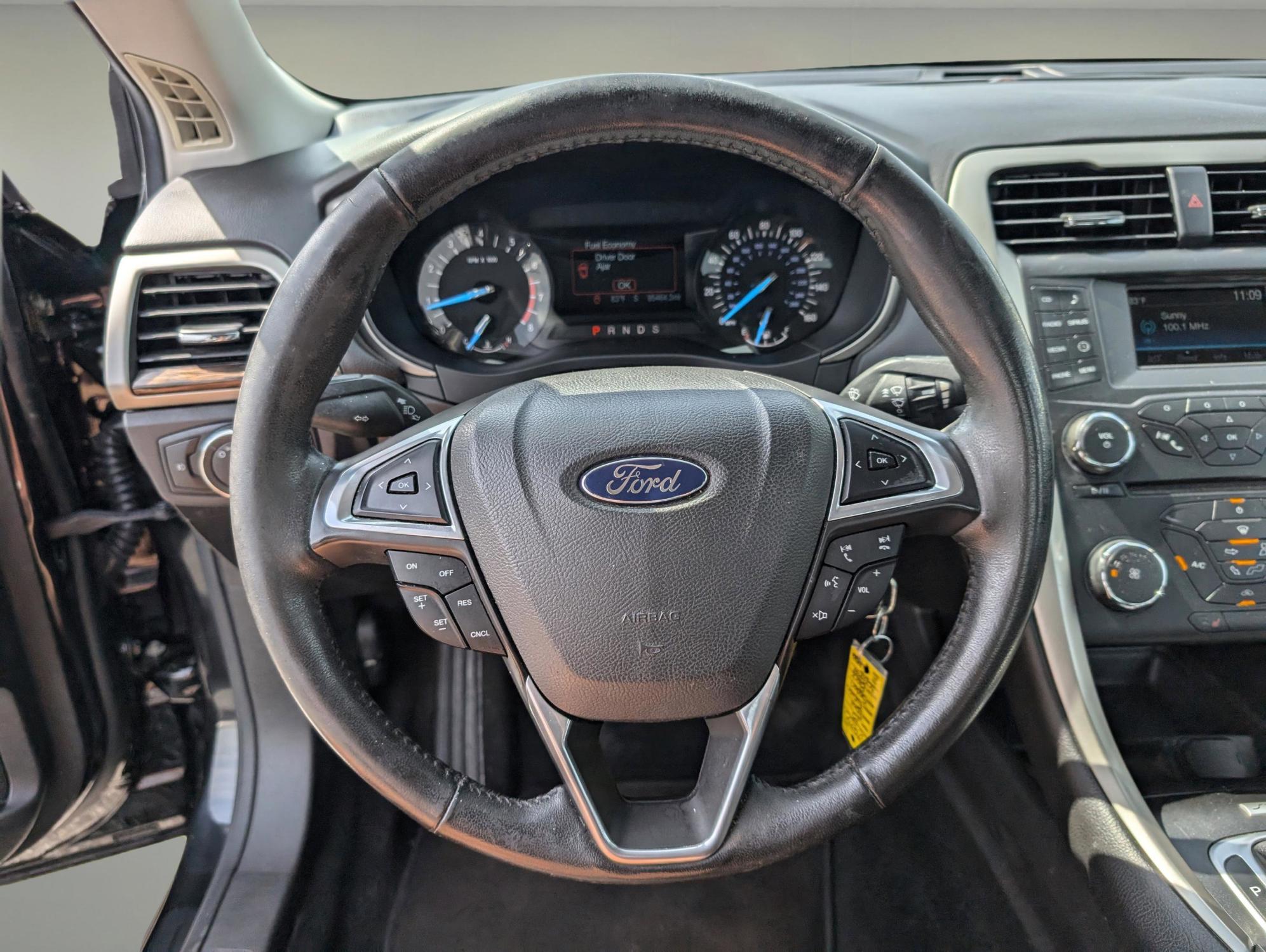 2015 Ford Fusion SE (3FA6P0HD0FR) with an Intercooled Turbo Regular Unleaded I-4 1.5 L/91 engine, located at 1430 Gateway Drive, Opelika, AL, 36801, (334) 239-0944, 32.637871, -85.409790 - 2015 Ford Fusion SE - Photo#15