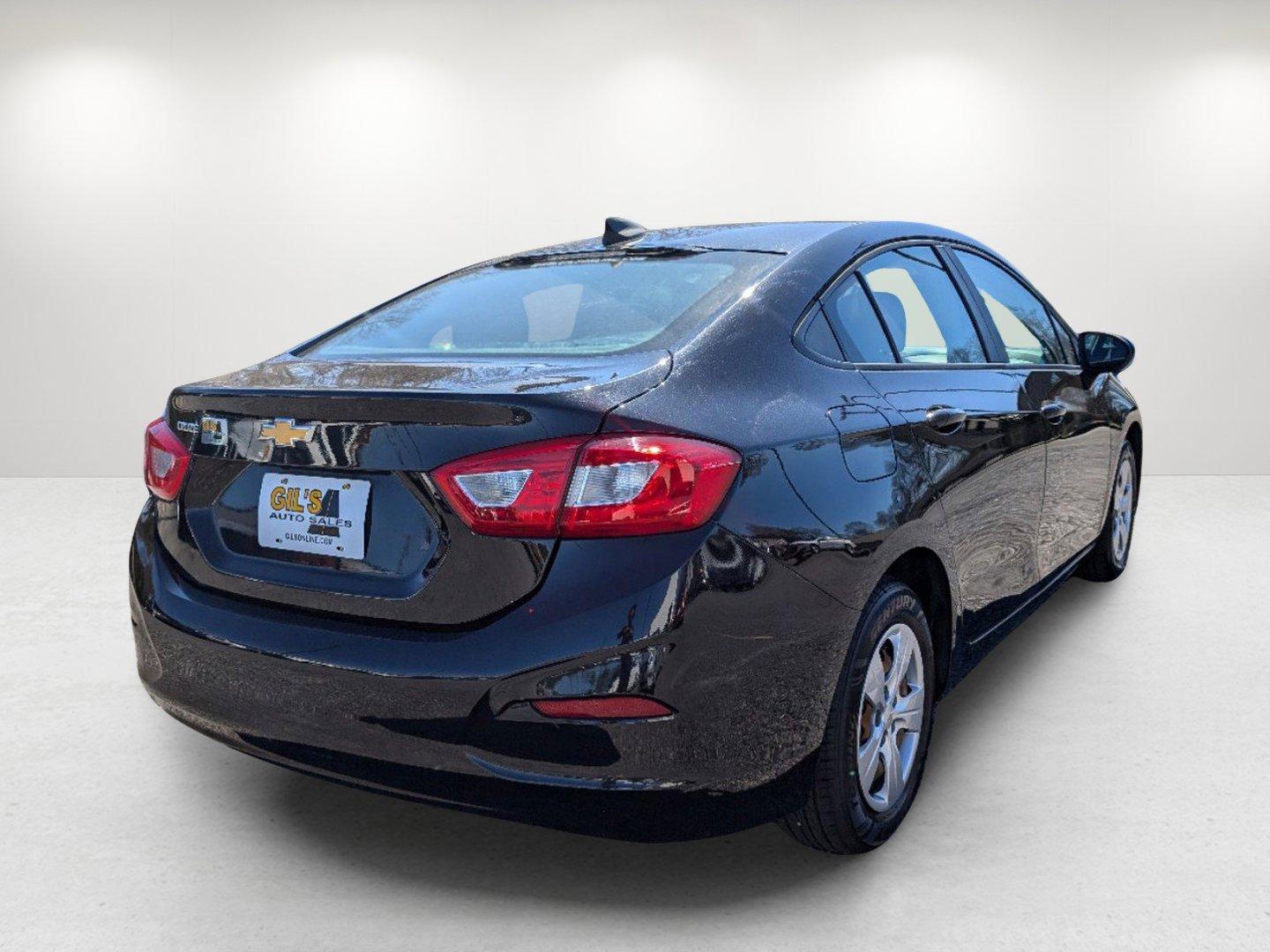 2016 /Jet Black Chevrolet Cruze LS (1G1BC5SM2G7) with an Turbocharged Gas I4 1.4L/ engine, 6-Speed Automatic transmission, located at 804 22nd Ave, Phenix City, AL, 36870, (334) 297-1860, 32.484749, -85.024475 - 2016 Chevrolet Cruze LS - Photo#4