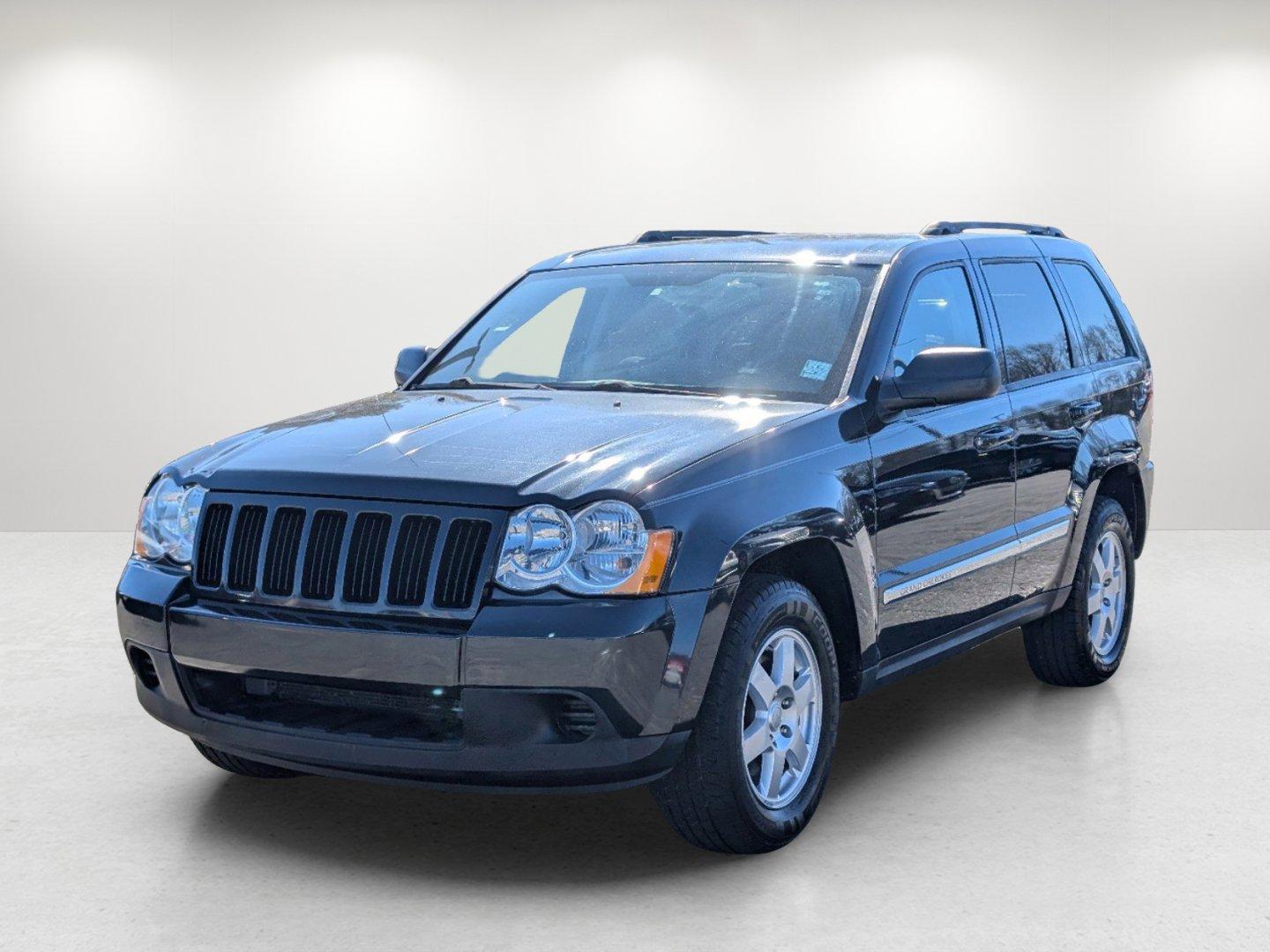 2010 /Dark Slate Gray Jeep Grand Cherokee Laredo (1J4PS4GK1AC) with an Gas V6 3.7L/226 engine, 5-Speed Automatic w/OD transmission, located at 521 Old Farm Lane Rd, Prattville, AL, 36066, (334) 325-1505, 32.482460, -86.416367 - 2010 Jeep Grand Cherokee Laredo - Photo#0