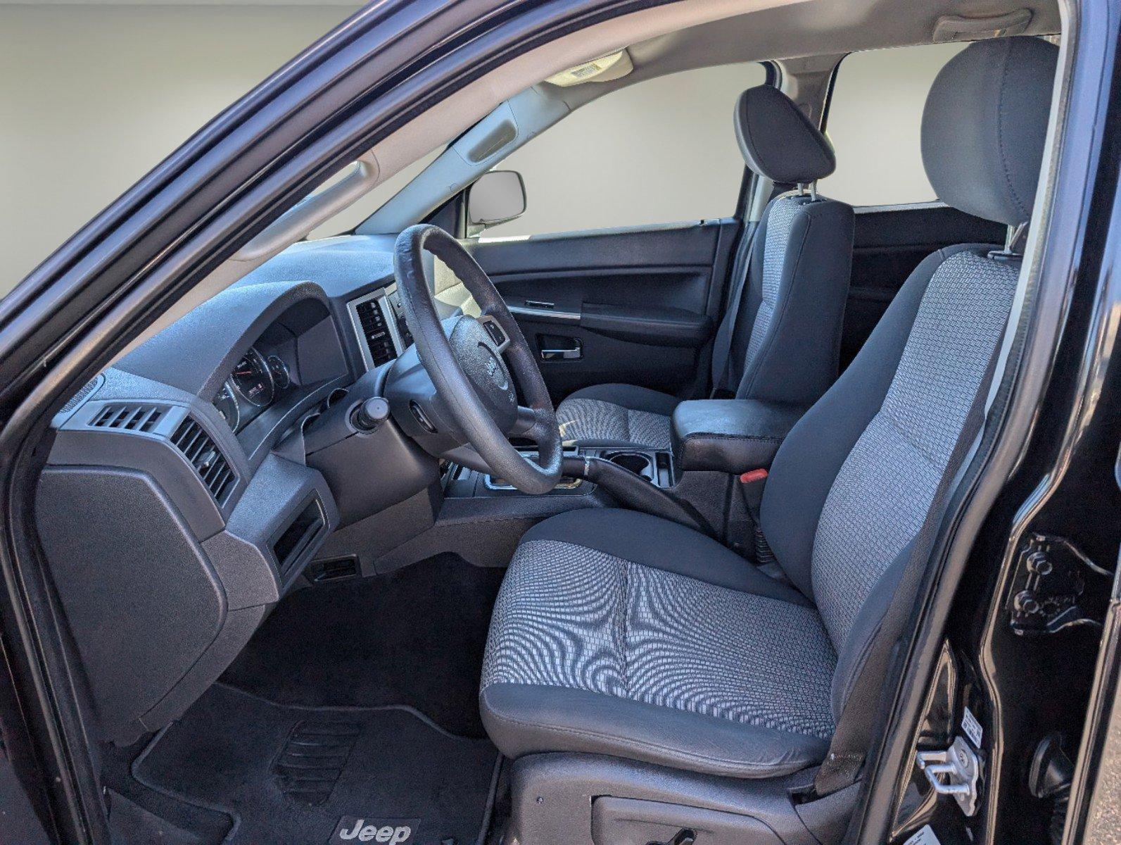 2010 /Dark Slate Gray Jeep Grand Cherokee Laredo (1J4PS4GK1AC) with an Gas V6 3.7L/226 engine, 5-Speed Automatic w/OD transmission, located at 521 Old Farm Lane Rd, Prattville, AL, 36066, (334) 325-1505, 32.482460, -86.416367 - 2010 Jeep Grand Cherokee Laredo - Photo#9