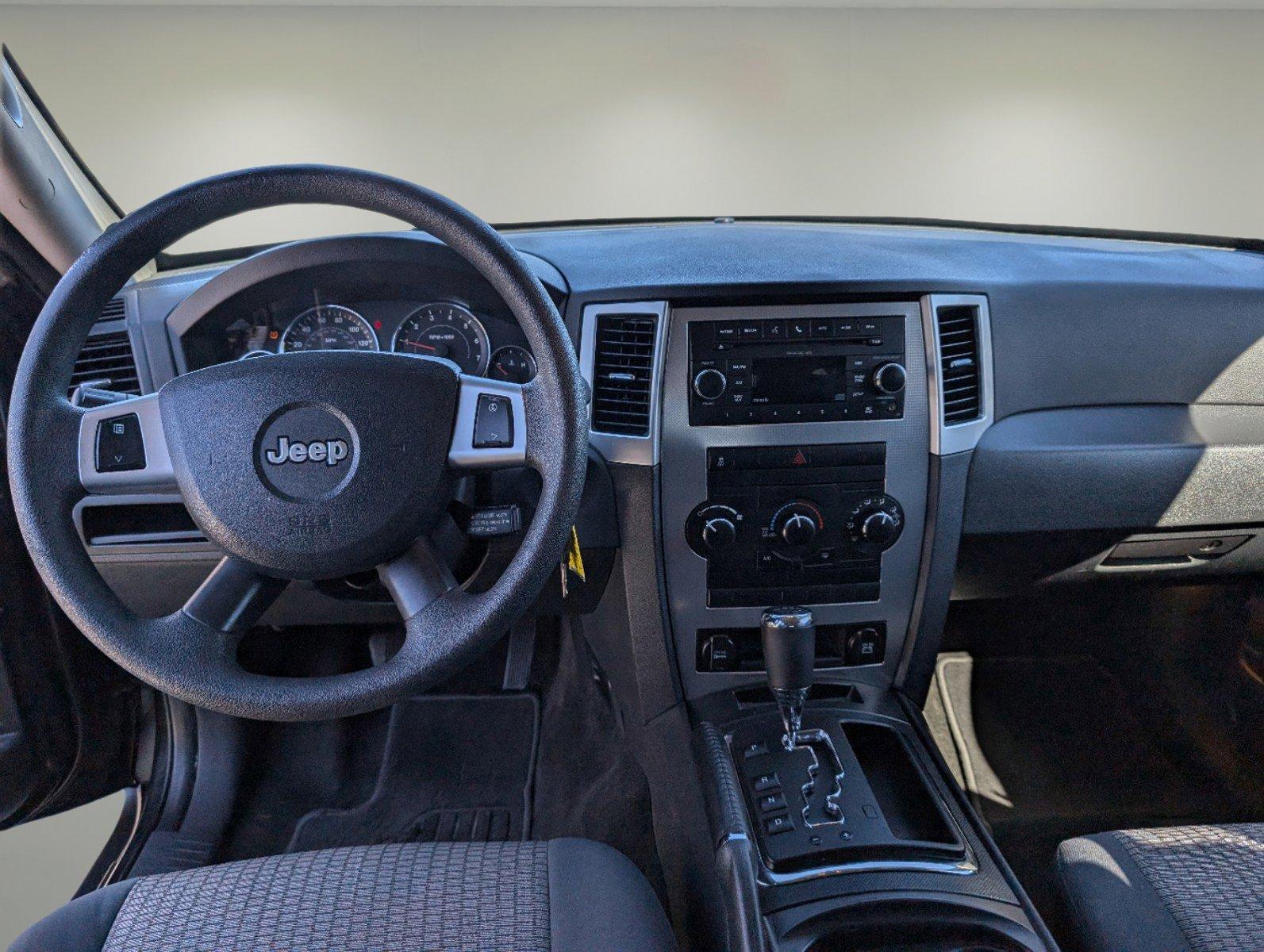 2010 /Dark Slate Gray Jeep Grand Cherokee Laredo (1J4PS4GK1AC) with an Gas V6 3.7L/226 engine, 5-Speed Automatic w/OD transmission, located at 521 Old Farm Lane Rd, Prattville, AL, 36066, (334) 325-1505, 32.482460, -86.416367 - 2010 Jeep Grand Cherokee Laredo - Photo#11