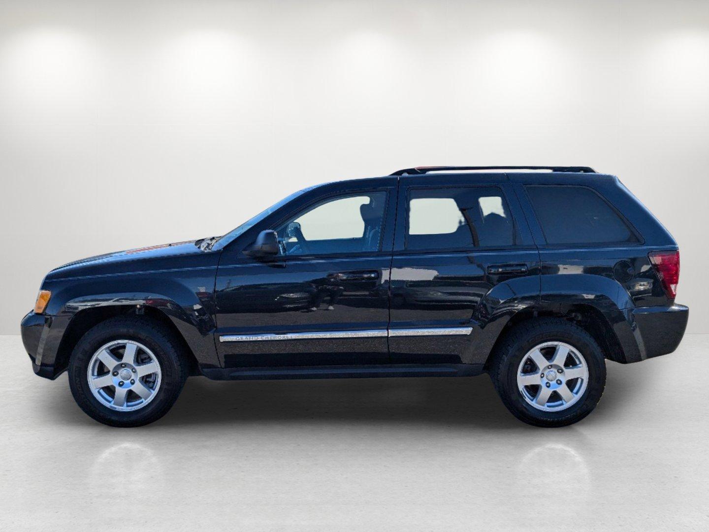 2010 /Dark Slate Gray Jeep Grand Cherokee Laredo (1J4PS4GK1AC) with an Gas V6 3.7L/226 engine, 5-Speed Automatic w/OD transmission, located at 521 Old Farm Lane Rd, Prattville, AL, 36066, (334) 325-1505, 32.482460, -86.416367 - 2010 Jeep Grand Cherokee Laredo - Photo#7