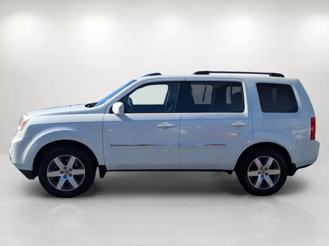 2013 Honda Pilot Touring (5FNYF3H95DB) with an Other engine, located at 3959 U.S. 80 W, Phenix City, AL, 36870, (334) 297-4885, 32.469296, -85.135185 - **Discover the 2013 Honda Pilot Touring Your Ultimate Family Adventurer at Gils Auto in Phenix City!**<br /> <br /> Are you ready to elevate your family adventures or elevate your daily commute? The 2013 Honda Pilot Touring is the perfect SUV for those who value space, comfort, and reliability. Wit - Photo#7