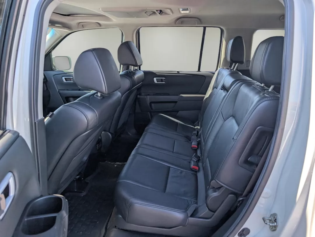 2013 Honda Pilot Touring (5FNYF3H95DB) with an Other engine, located at 3959 U.S. 80 W, Phenix City, AL, 36870, (334) 297-4885, 32.469296, -85.135185 - **Discover the 2013 Honda Pilot Touring Your Ultimate Family Adventurer at Gils Auto in Phenix City!**<br /> <br /> Are you ready to elevate your family adventures or elevate your daily commute? The 2013 Honda Pilot Touring is the perfect SUV for those who value space, comfort, and reliability. Wit - Photo#10