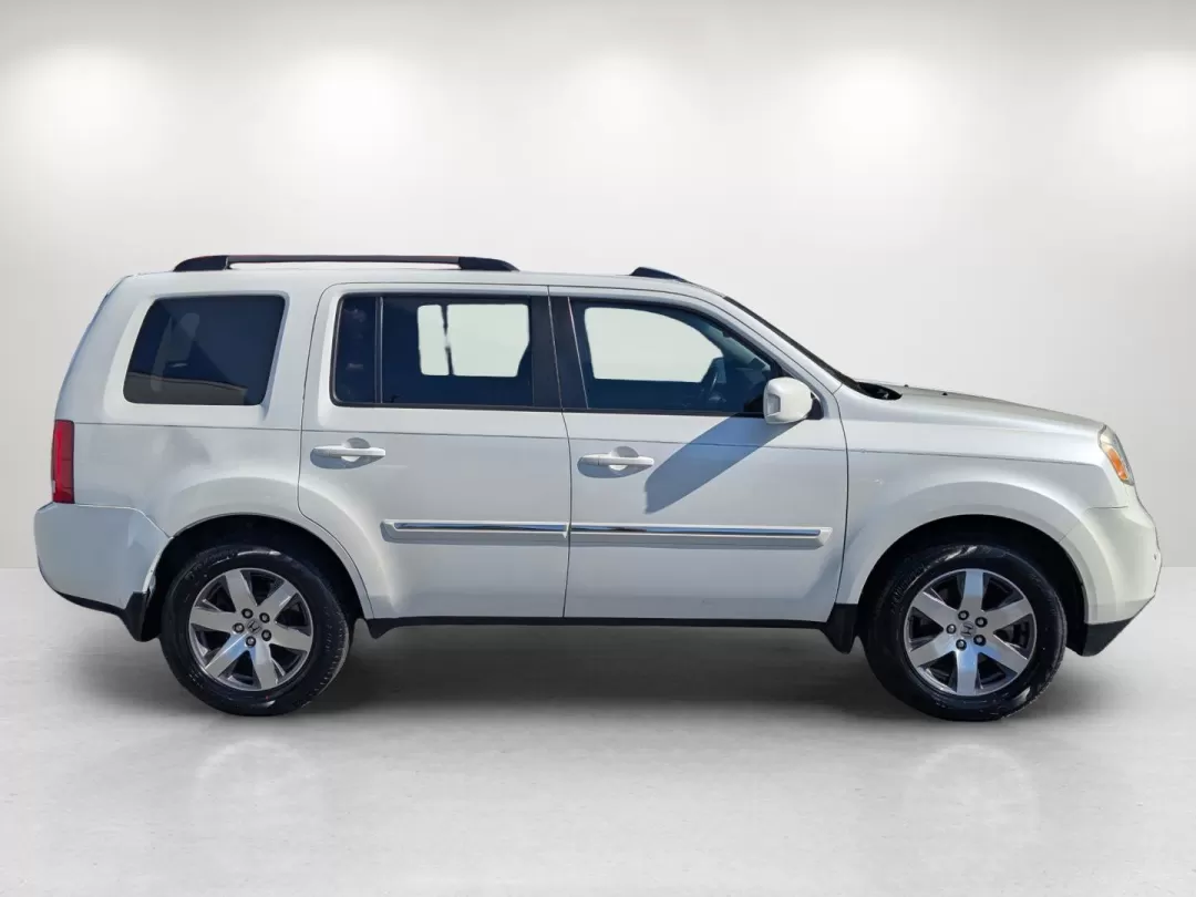 2013 Honda Pilot Touring (5FNYF3H95DB) with an Other engine, located at 804 22nd Ave, Phenix City, AL, 36870, (334) 297-1860, 32.484749, -85.024475 - **Discover the 2013 Honda Pilot Touring Your Ultimate Family Adventurer at Gils Auto in Phenix City!**<br /> <br /> Are you ready to elevate your family adventures or elevate your daily commute? The 2013 Honda Pilot Touring is the perfect SUV for those who value space, comfort, and reliability. Wit - Photo#3