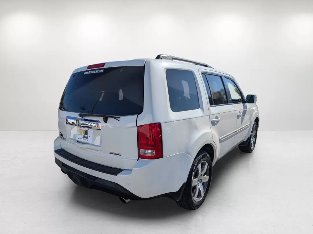 2013 Honda Pilot Touring (5FNYF3H95DB) with an Other engine, located at 804 22nd Ave, Phenix City, AL, 36870, (334) 297-1860, 32.484749, -85.024475 - **Discover the 2013 Honda Pilot Touring Your Ultimate Family Adventurer at Gils Auto in Phenix City!**<br /> <br /> Are you ready to elevate your family adventures or elevate your daily commute? The 2013 Honda Pilot Touring is the perfect SUV for those who value space, comfort, and reliability. Wit - Photo#4