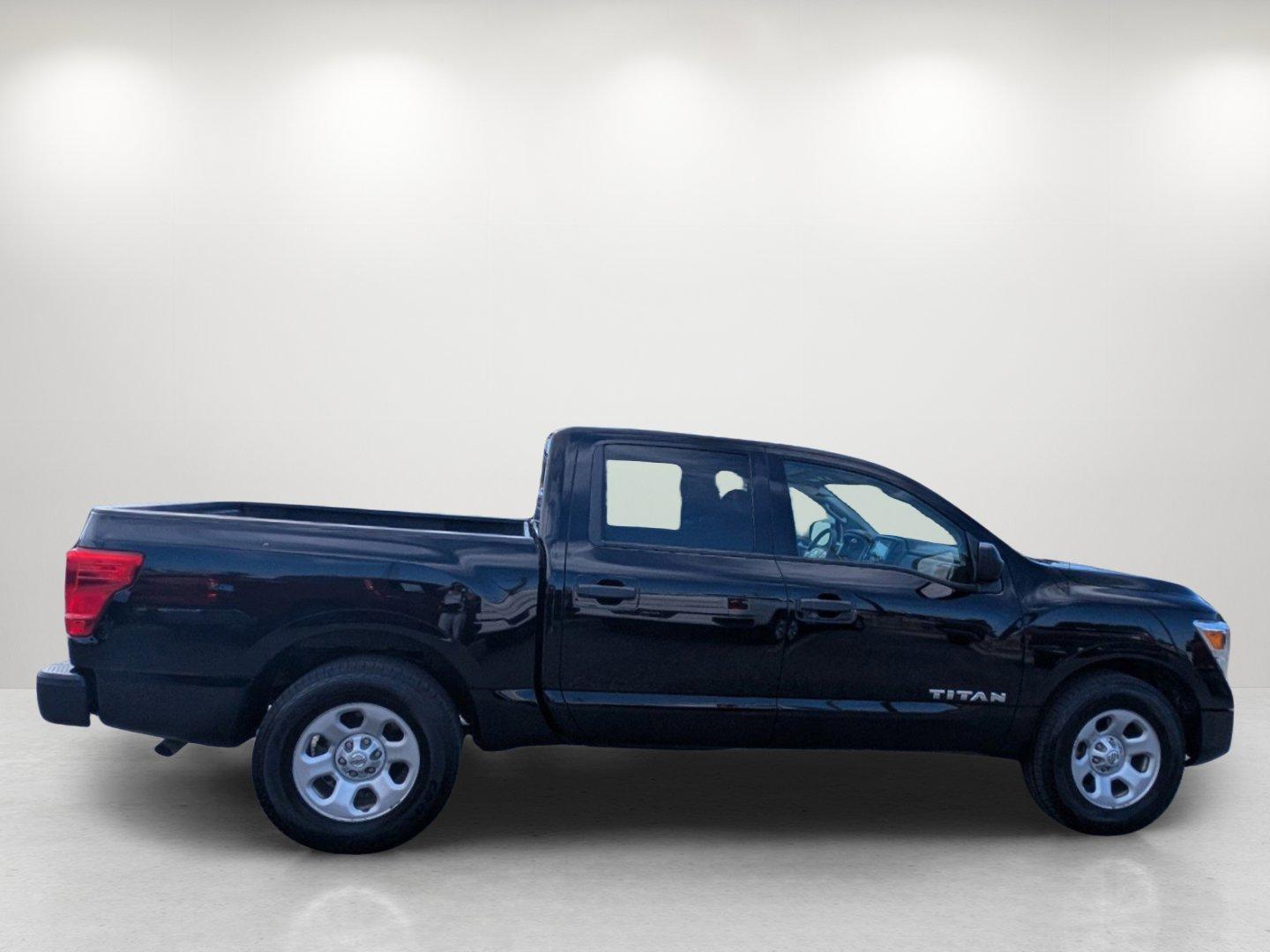 2021 /Black Nissan Titan S (1N6AA1EE4MN) with an Premium Unleaded V-8 5.6 L/339 engine, 9-Speed Automatic w/OD transmission, located at 1430 Gateway Drive, Opelika, AL, 36801, (334) 239-0944, 32.637871, -85.409790 - 2021 Nissan Titan S - Photo#3