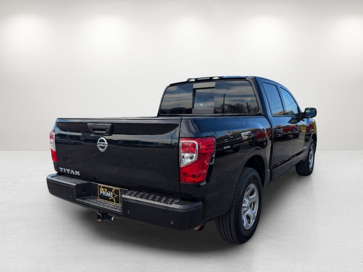 2021 /Black Nissan Titan S (1N6AA1EE4MN) with an Premium Unleaded V-8 5.6 L/339 engine, 9-Speed Automatic w/OD transmission, located at 1430 Gateway Drive, Opelika, AL, 36801, (334) 239-0944, 32.637871, -85.409790 - 2021 Nissan Titan S - Photo#4