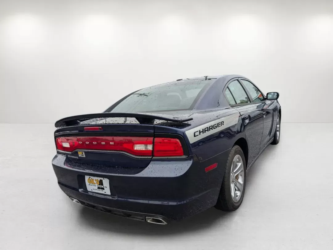 2014 /Black Dodge Charger SE (2C3CDXBGXEH) with an Other engine, located at 1430 Gateway Drive, Opelika, AL, 36801, (334) 239-0944, 32.637871, -85.409790 - **Unleash Your Adventurous Side with the 2014 Dodge Charger SE from Gils Auto in Prattville, AL!**<br /> <br /> Are you ready to elevate your driving experience? Whether you're a growing family looking for a reliable vehicle, a commuter seeking style without sacrificing comfort, or an adventure enth - Photo#4