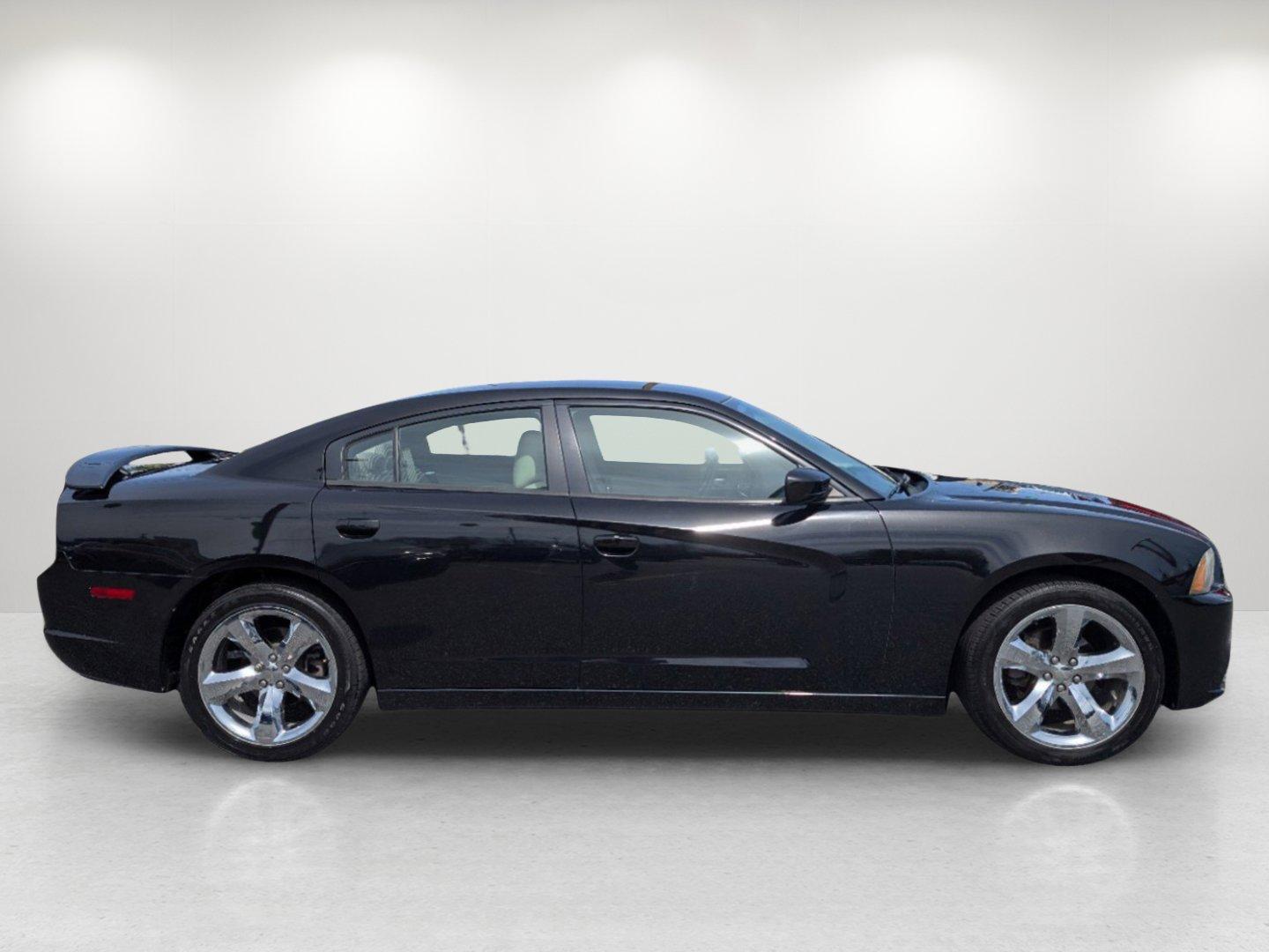 2011 /Black/Light Frost Beige Interior Dodge Charger Rallye (2B3CL3CG8BH) with an Gas V6 3.6L/220 engine, 5-Speed Automatic transmission, located at 3959 U.S. 80 W, Phenix City, AL, 36870, (334) 297-4885, 32.469296, -85.135185 - 2011 Dodge Charger Rallye - Photo#3