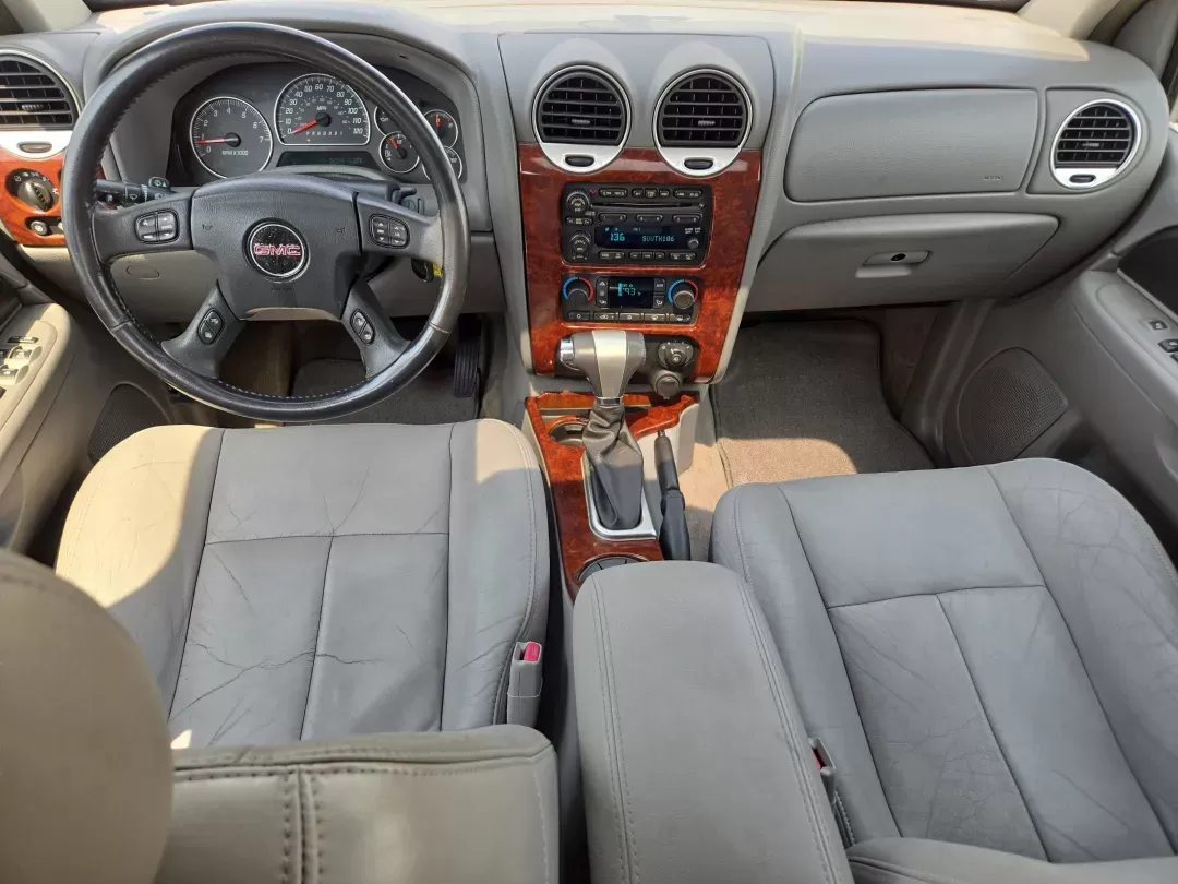 2006 /Light Gray GMC Envoy SLT (1GKDS13S662) with an Other engine, located at 521 Old Farm Lane Rd, Prattville, AL, 36066, (334) 325-1505, 32.482460, -86.416367 - **Explore Adventure with This 2006 GMC Envoy SLT at Gils Auto - Prattville!** <br /> <br /> Are you ready to elevate your weekend getaways or daily commutes? Look no further! This 2006 GMC Envoy SLT is the perfect companion for your family adventures, daily drives through Prattville, or trips to nea - Photo#13