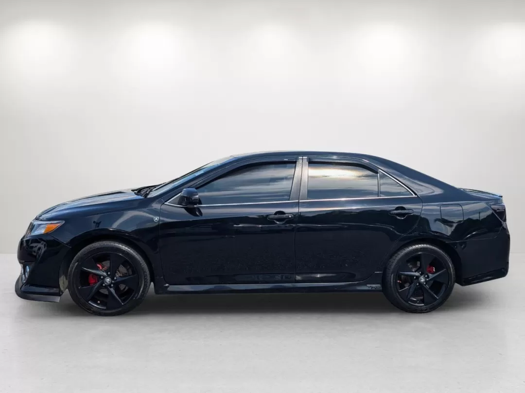 2012 Toyota Camry SE (4T1BF1FK8CU) with an Other engine, located at 1430 Gateway Drive, Opelika, AL, 36801, (334) 239-0944, 32.637871, -85.409790 - Experience the ultimate blend of reliability and comfort with the 2012 Toyota Camry SE, available now at Gils Auto in Opelika, AL. This sedan is perfect for those seeking a dependable daily driver or a family-friendly vehicle that doesn't compromise on style. Whether you're commuting to work, shuttl - Photo#8